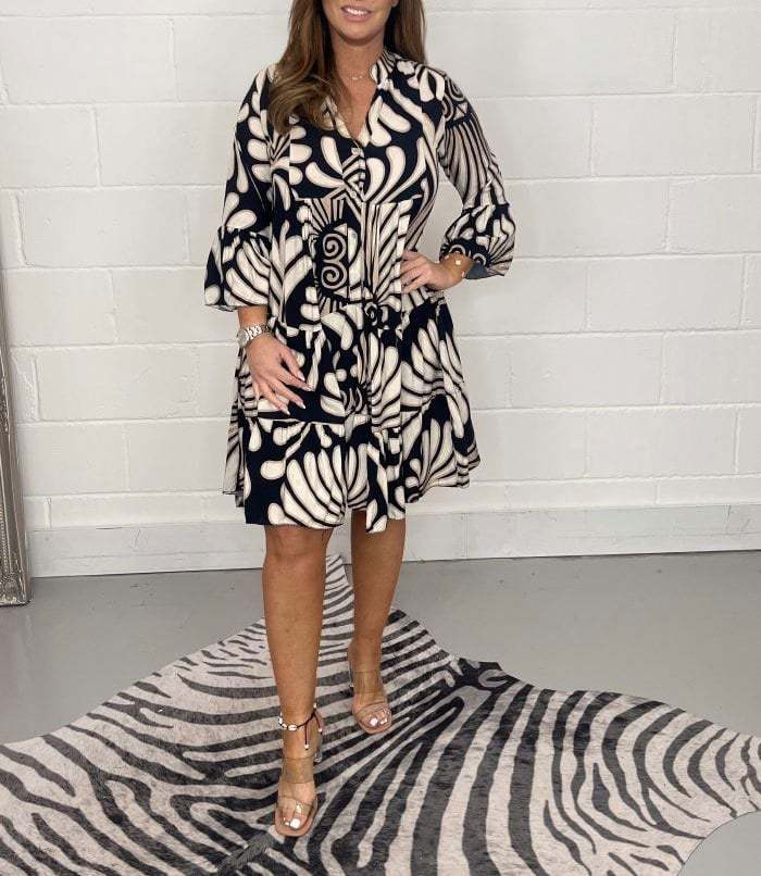 Olivoslindo Vestido holgado de manga larga estampado