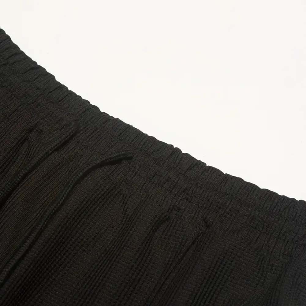 2024 nuevos pantalones de jogging de pie pequeño a cuadros tipo gofre para hombres