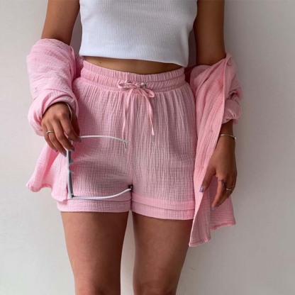 Traje de mujer (camisa de manga larga + pantalón corto)