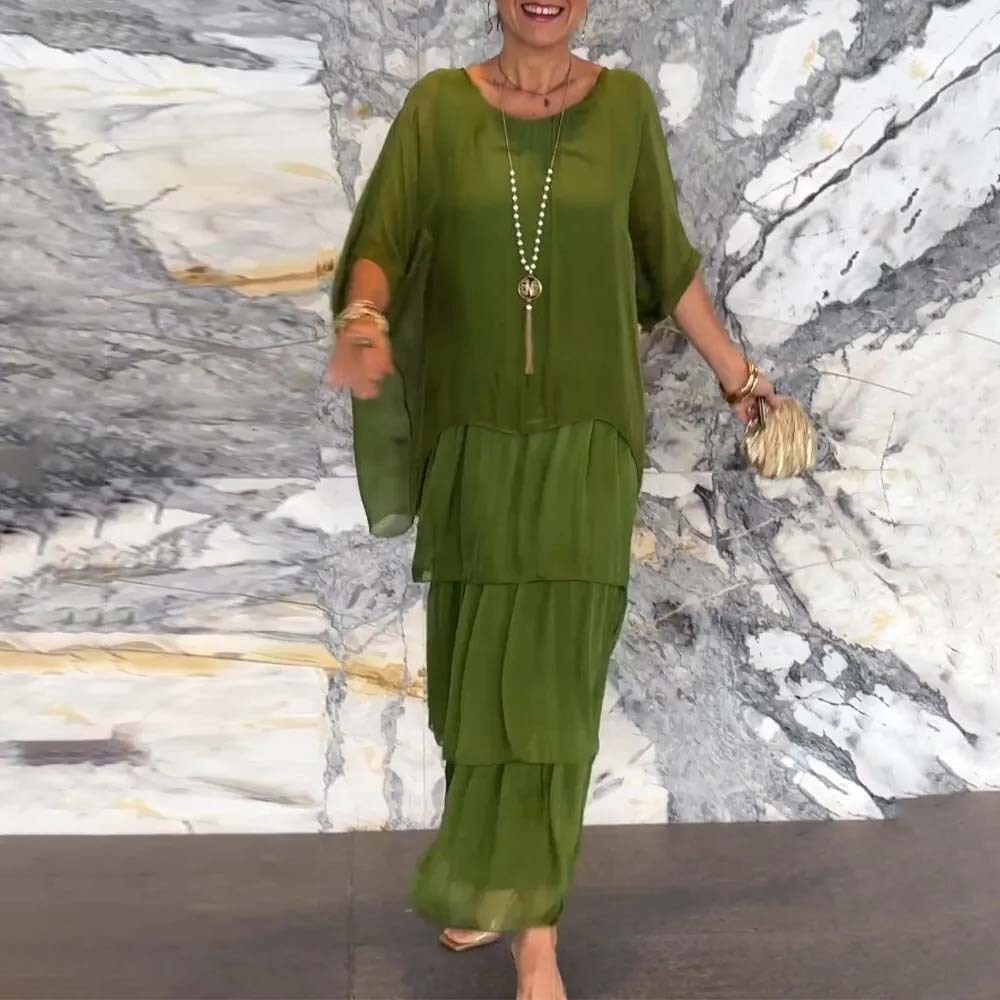 Elegante vestido suelto con cuello redondo y manga murciélago