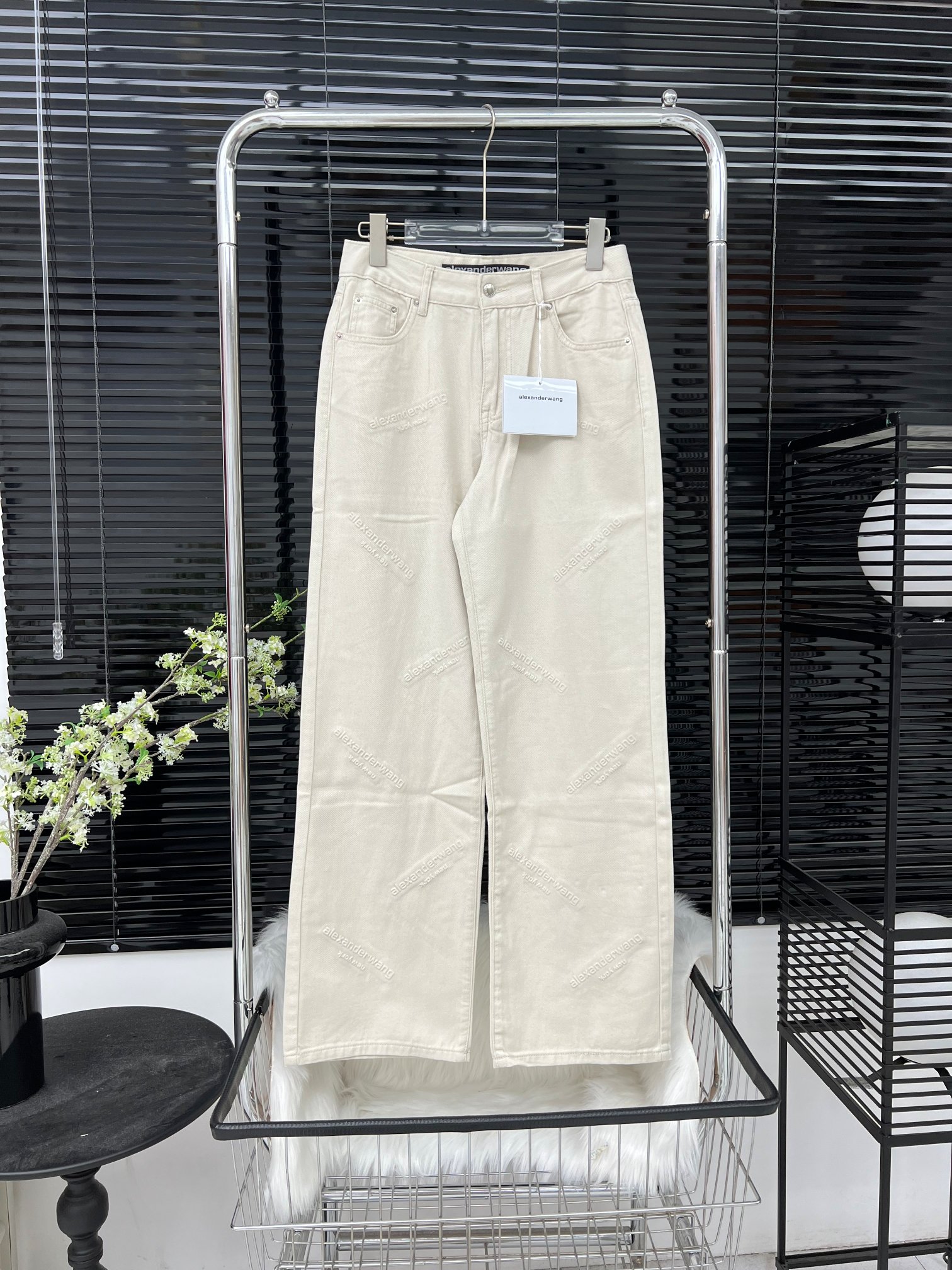 AW king letter embossed beige trousers
