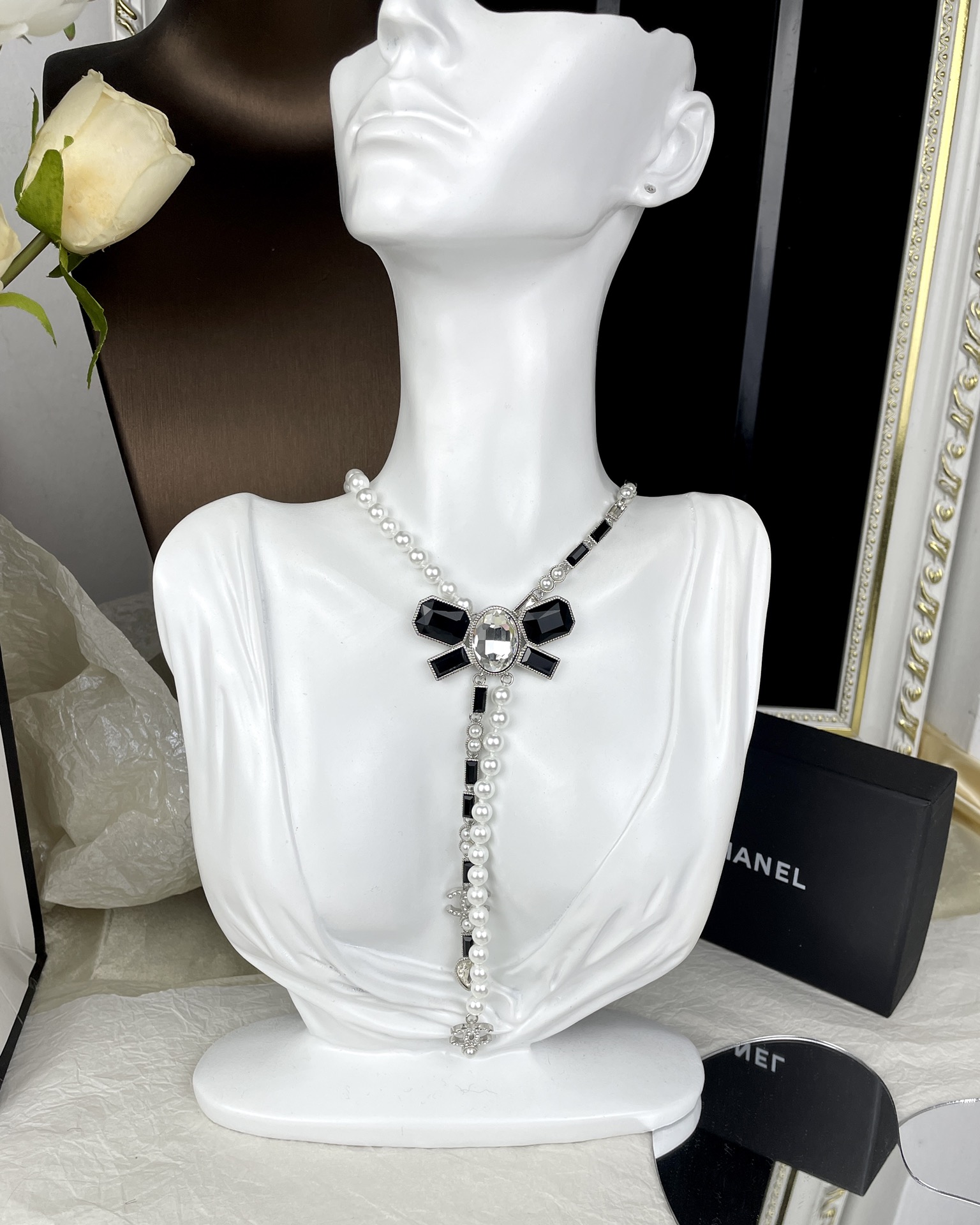 Chanel black bow pearl patchwork long necklace