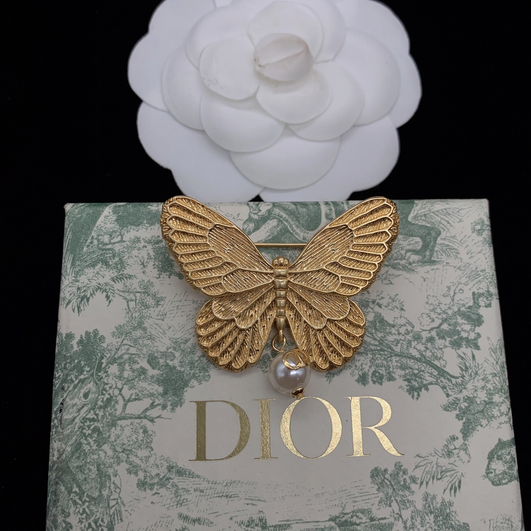 Dior bow pearl brooch