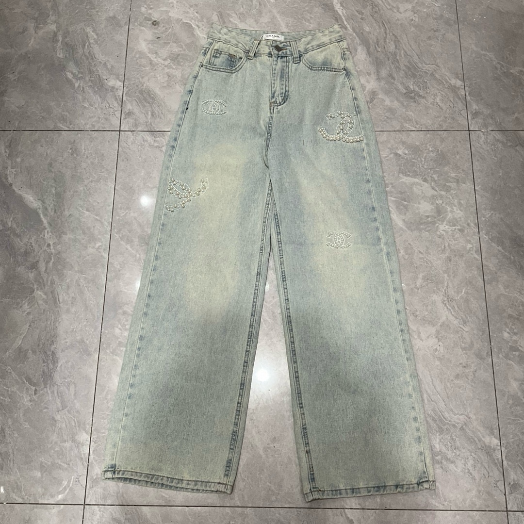 Chanel pearl embellished washed jeans