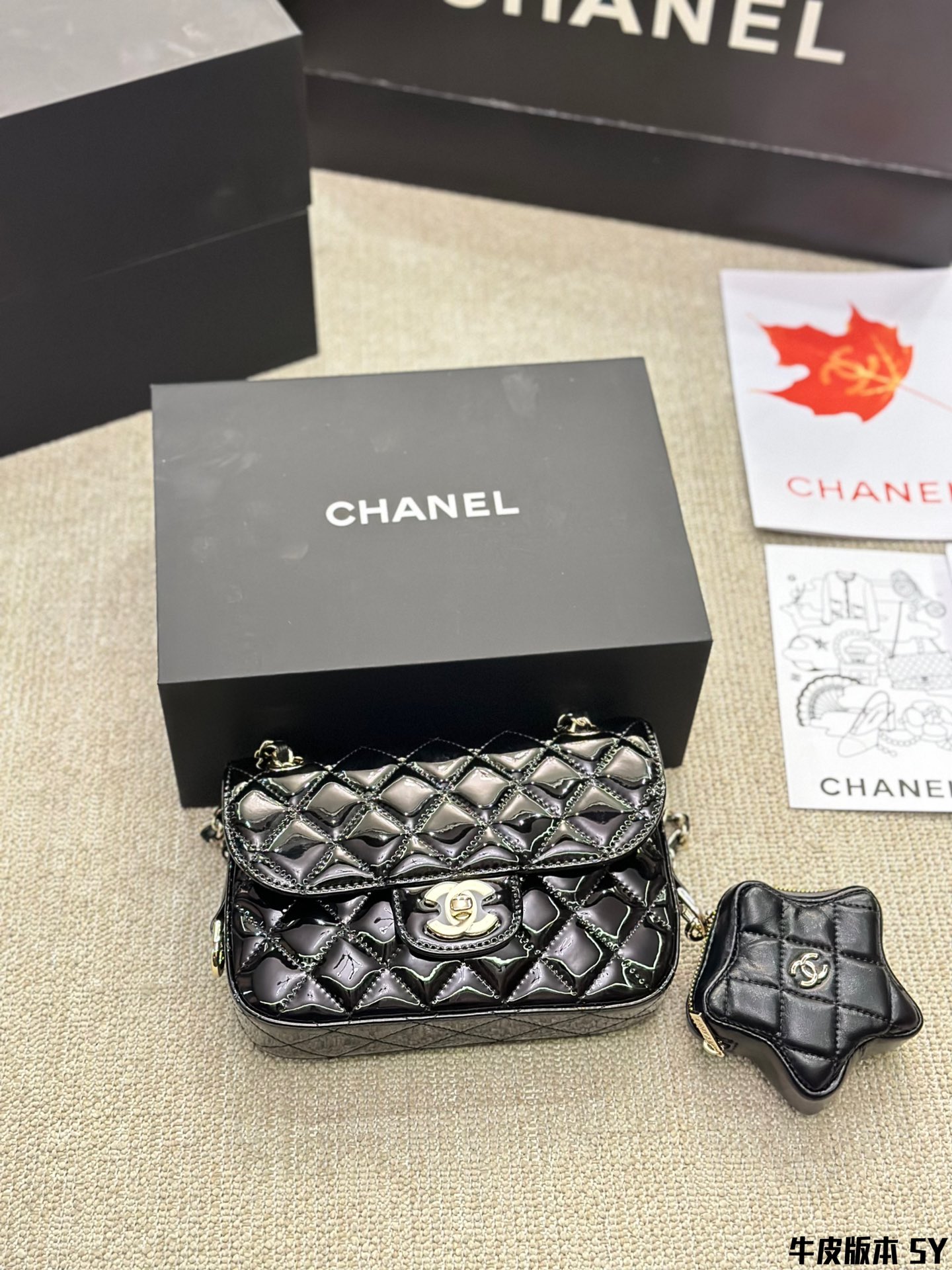 Chanel glossy patent leather flap bag with star charm