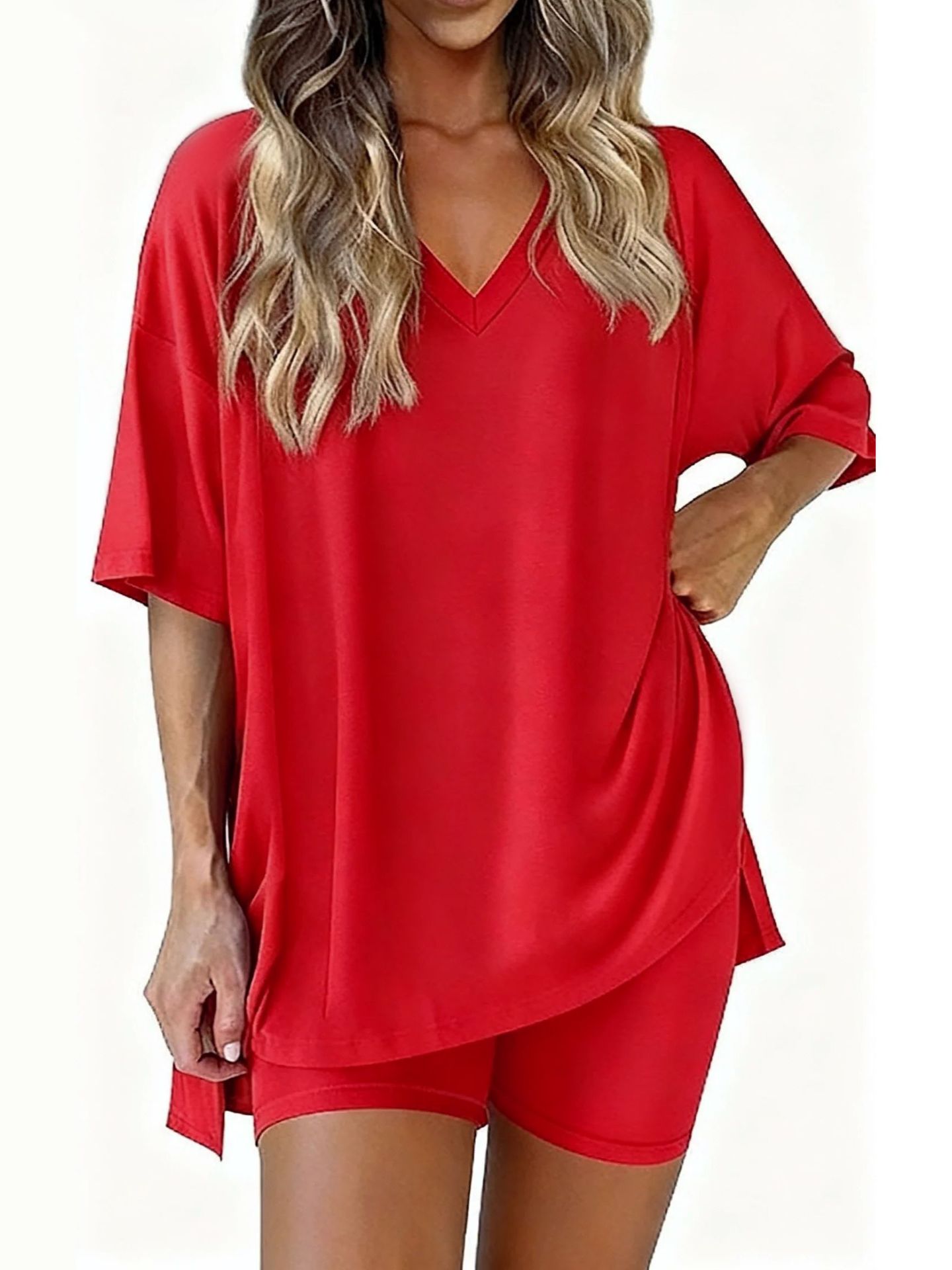 Women's two-piece casual loungewear set: loose-fitting top with a slit hem and fitted shorts