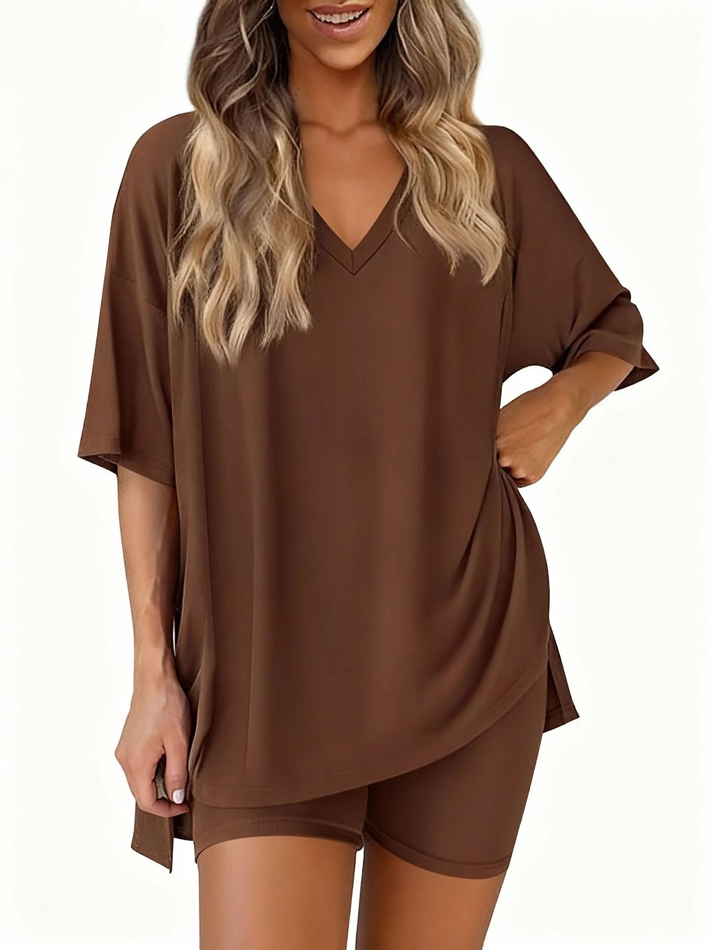 Women's two-piece casual loungewear set: loose-fitting top with a slit hem and fitted shorts