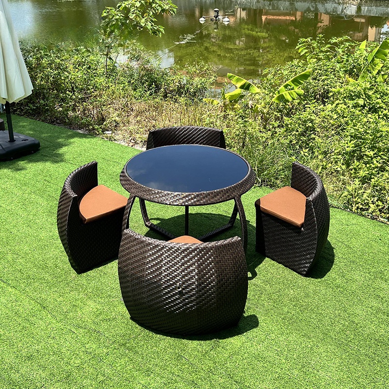 Creative splicing of outdoor villas, storage of rattan woven tables and chairs, outdoor garden courtyard waterproof and sunscreen rattan chairs