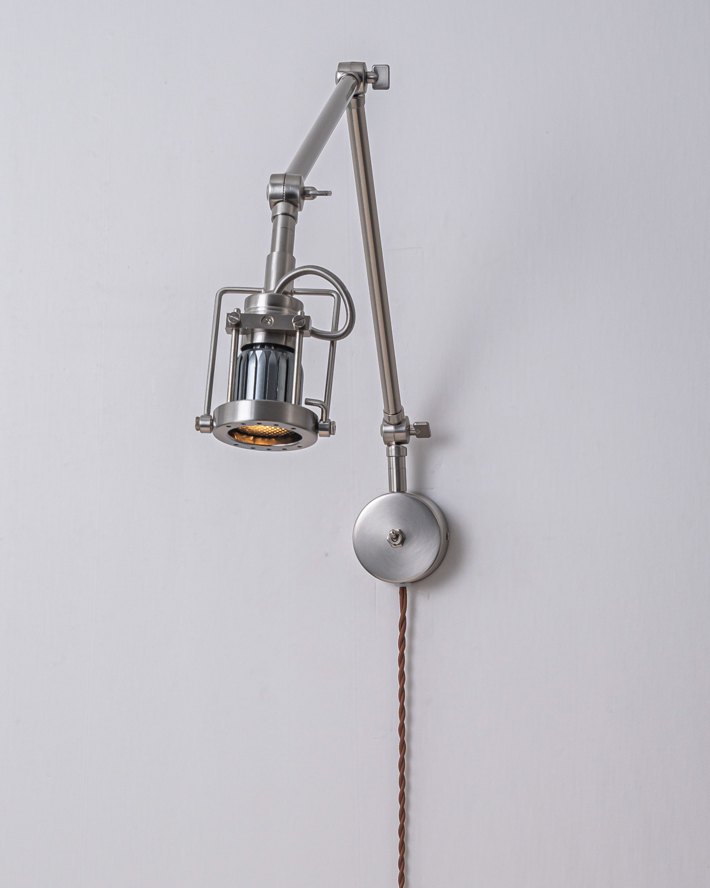 Rivet Swing Arm Wall Lamp