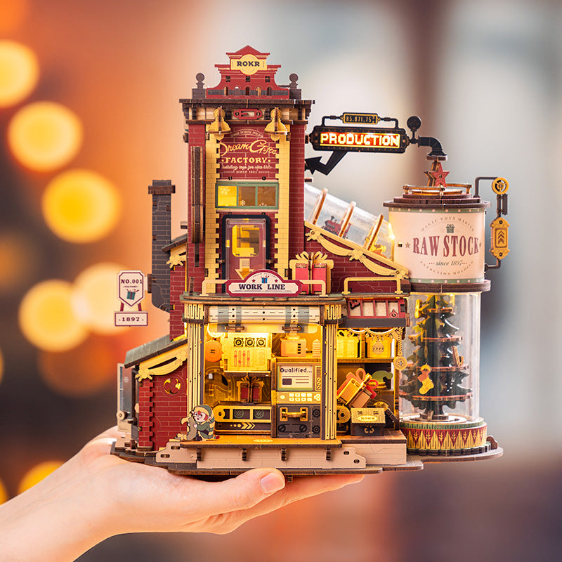One hand holding Dream Gift Factory