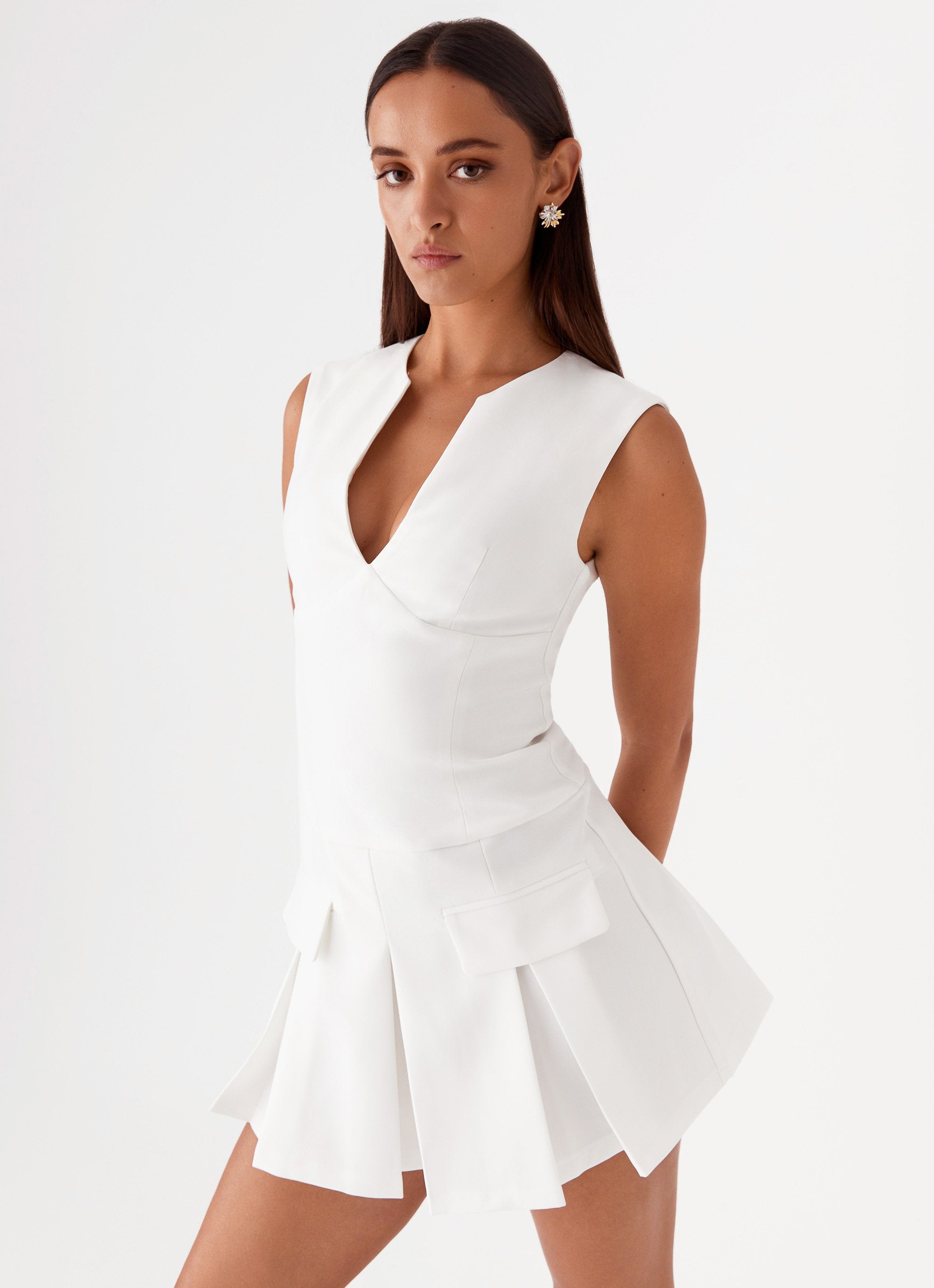 Womens Cassia Mini Dress in the colour White in front of a light grey background
