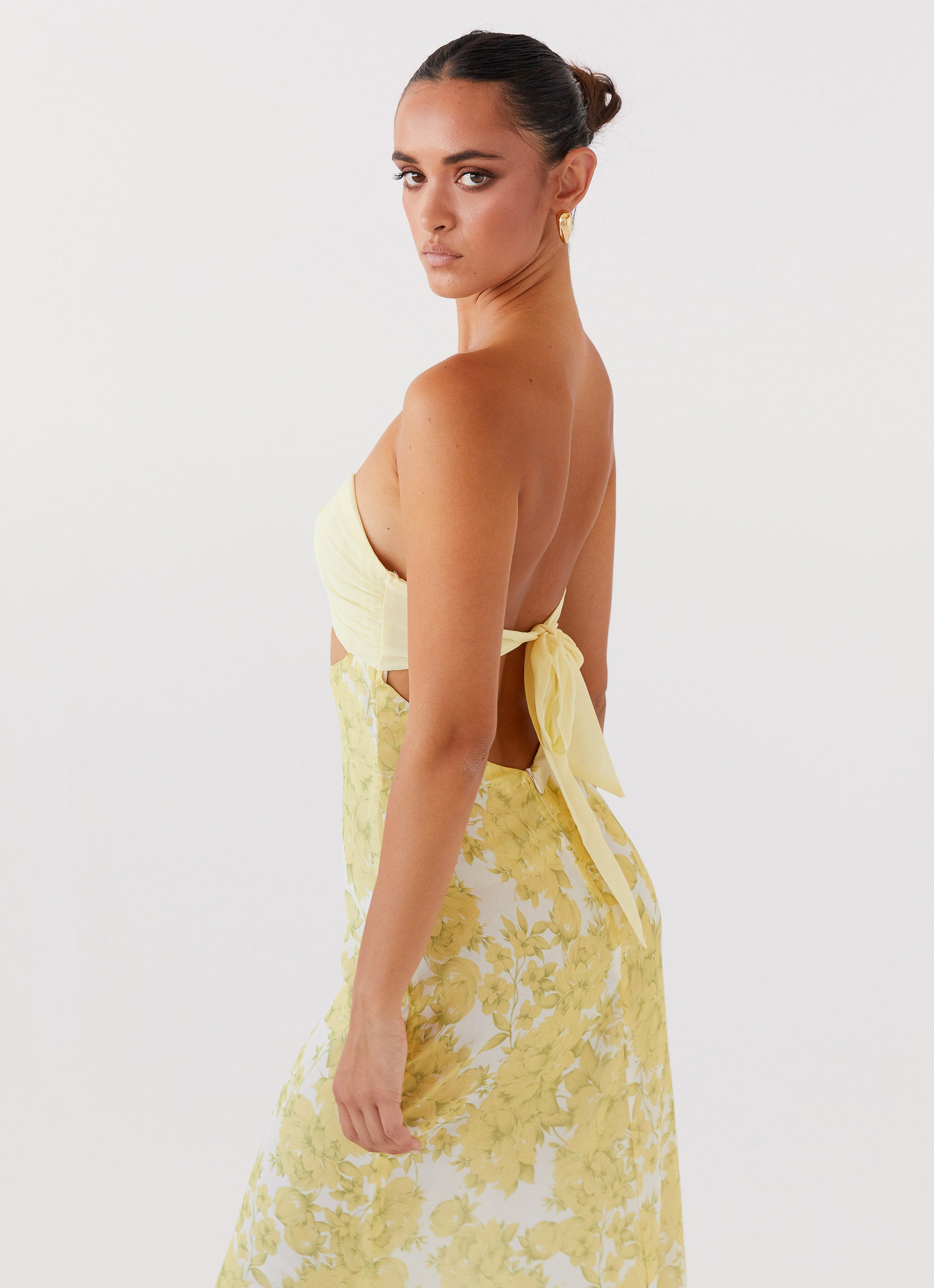 Womens Tropicana Maxi Dress in the colour Daffodil in front of a light grey background