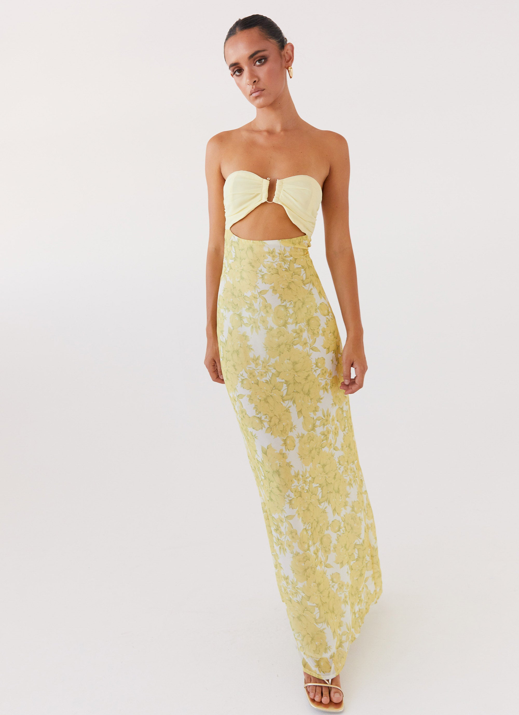 Womens Tropicana Maxi Dress in the colour Daffodil in front of a light grey background
