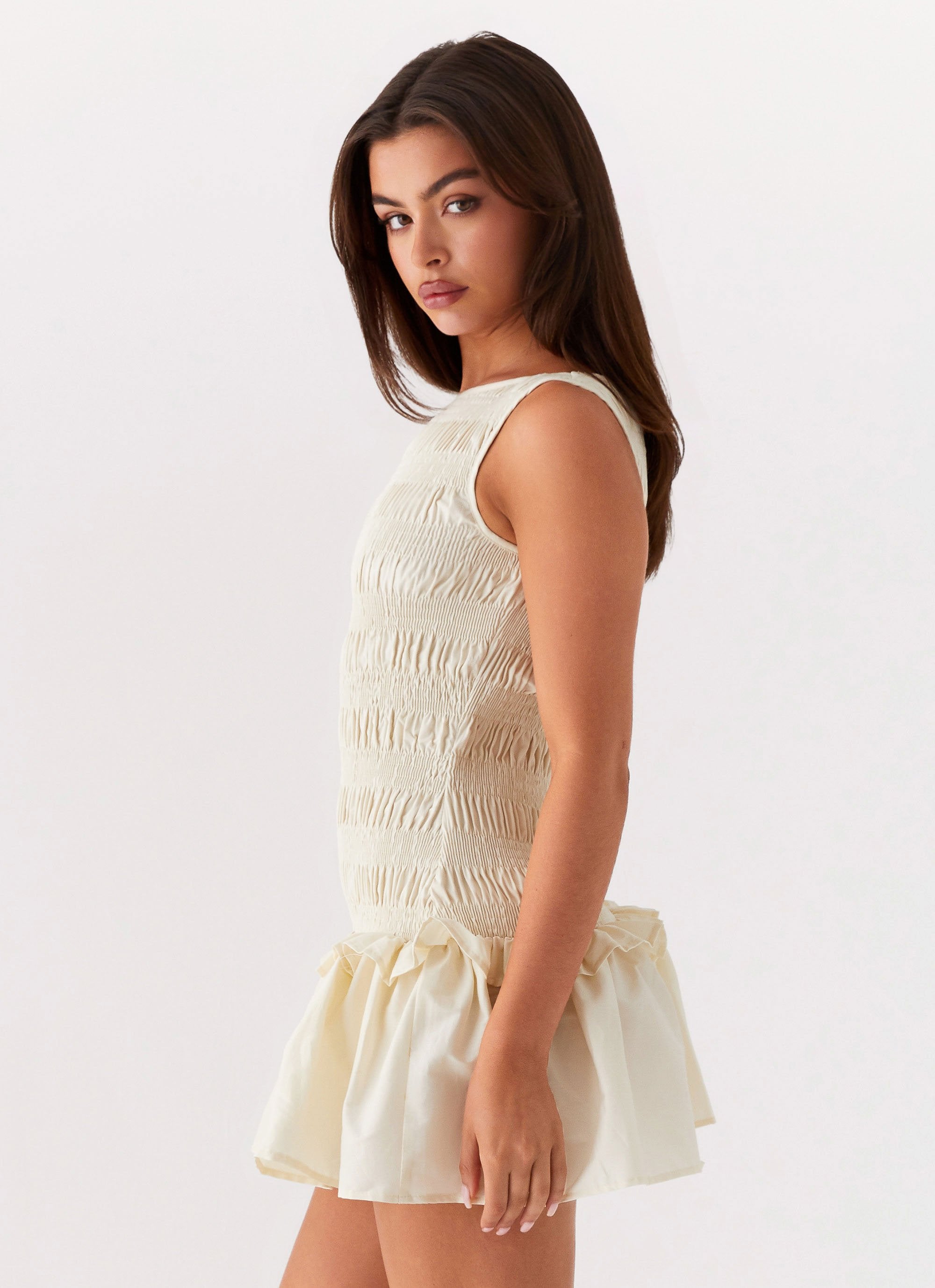 Womens Garden Kiss Mini Dress in the colour Ivory in front of a light grey background