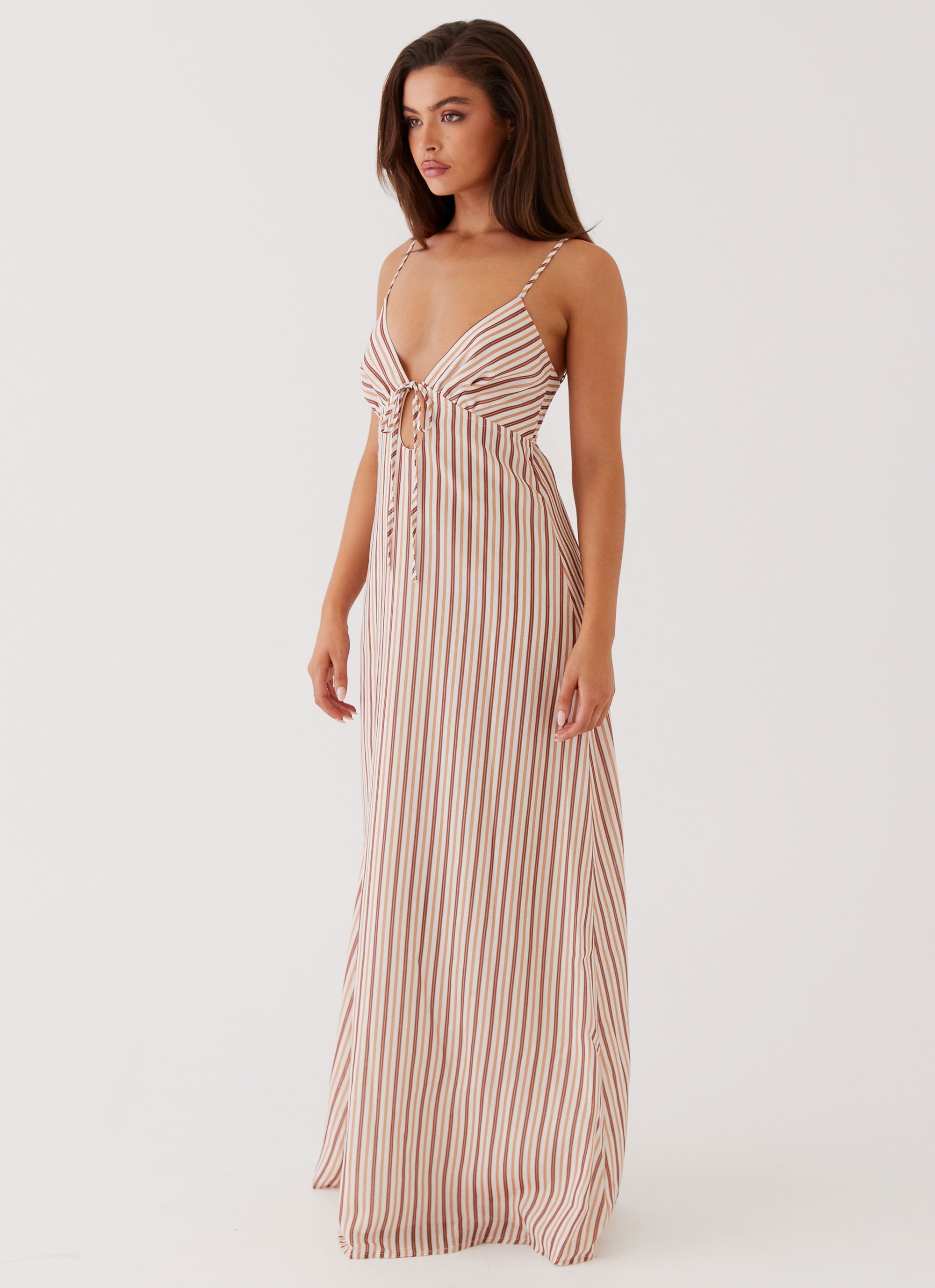 Womens Flora Linen Maxi Dress in the colour Passionfruit Stripe in front of a light grey background