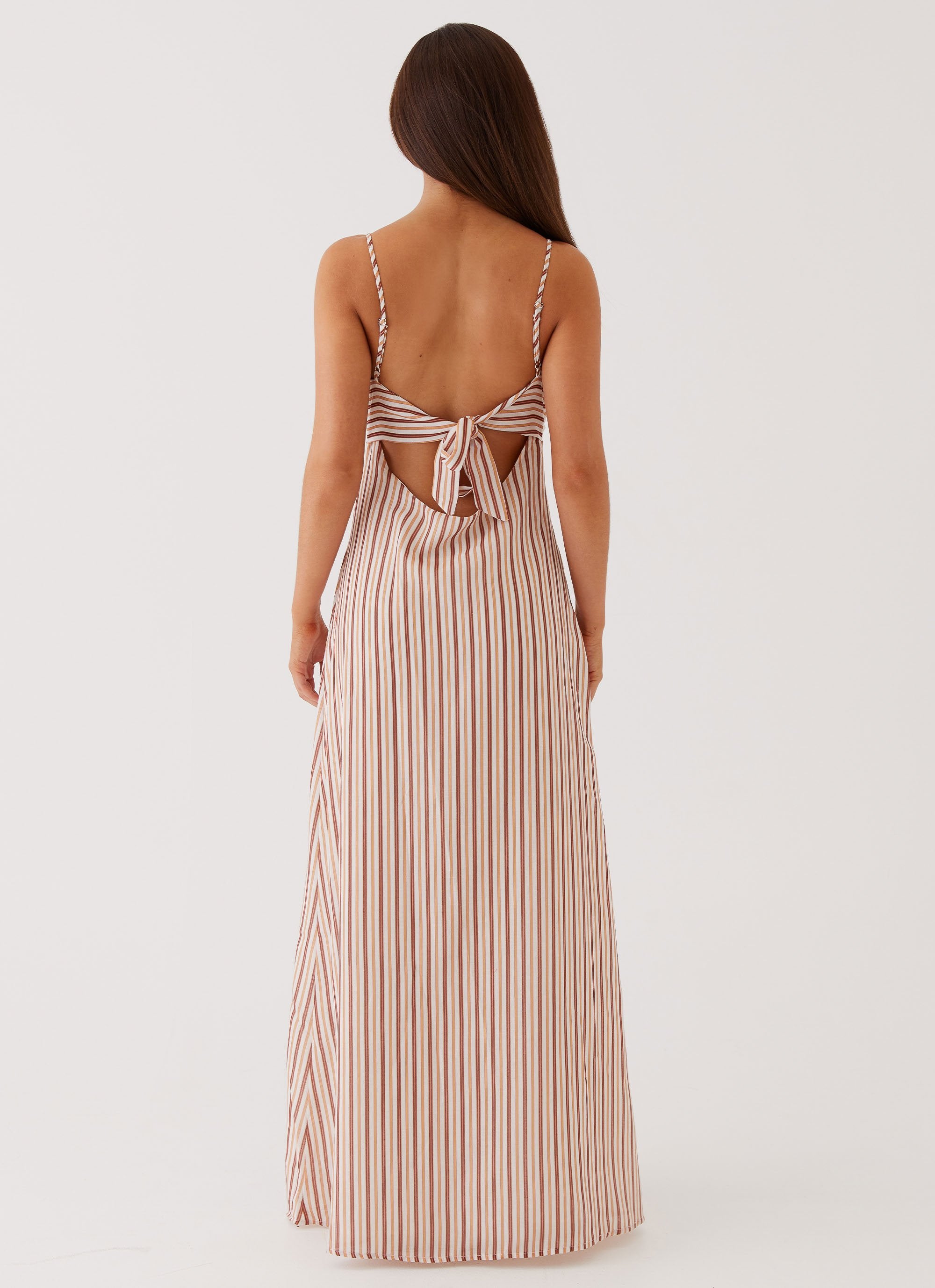 Womens Flora Linen Maxi Dress in the colour Passionfruit Stripe in front of a light grey background