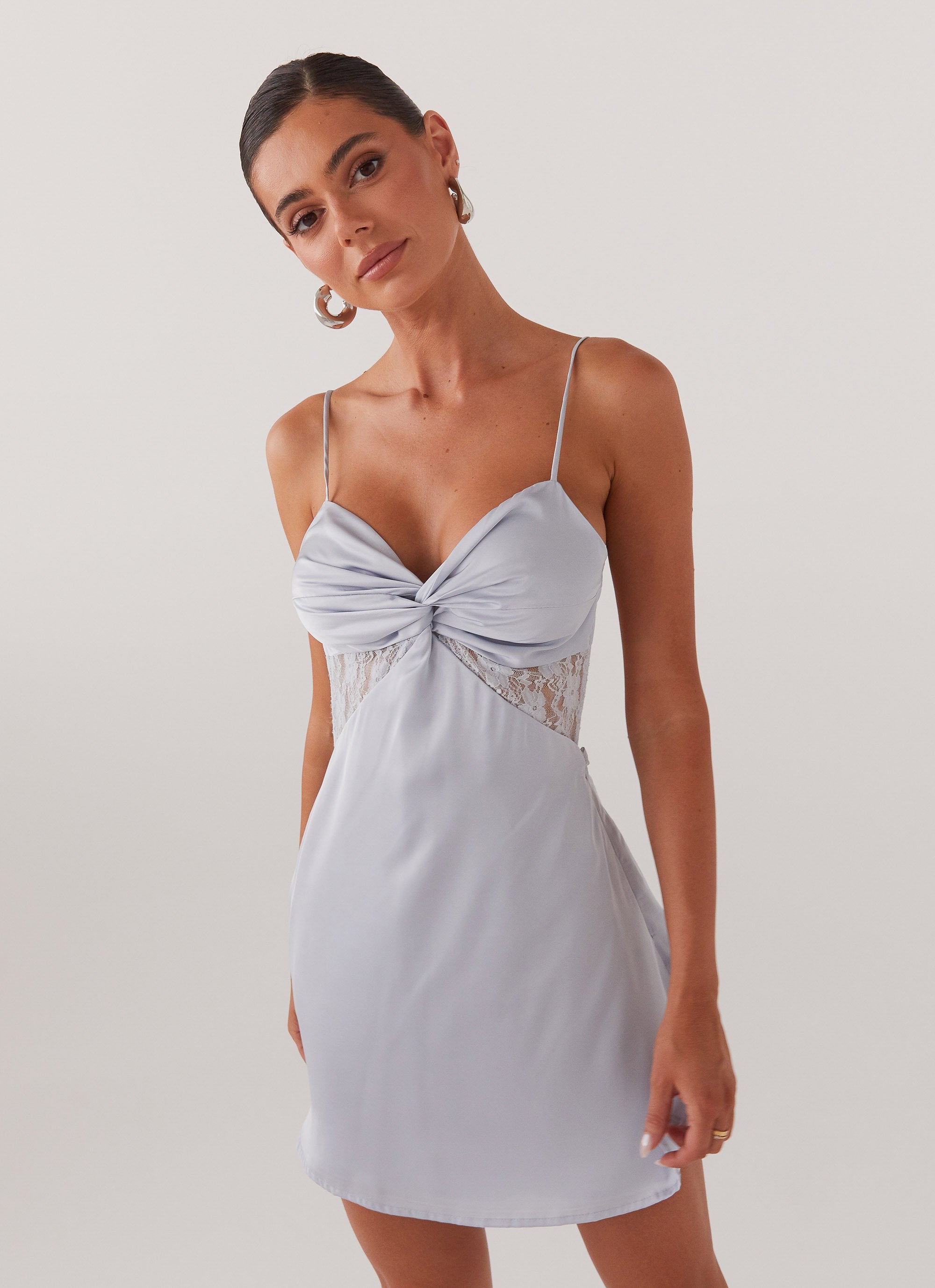 Womens Ayla Satin Mini Dress in the colour Arctic Blue in front of a light grey background