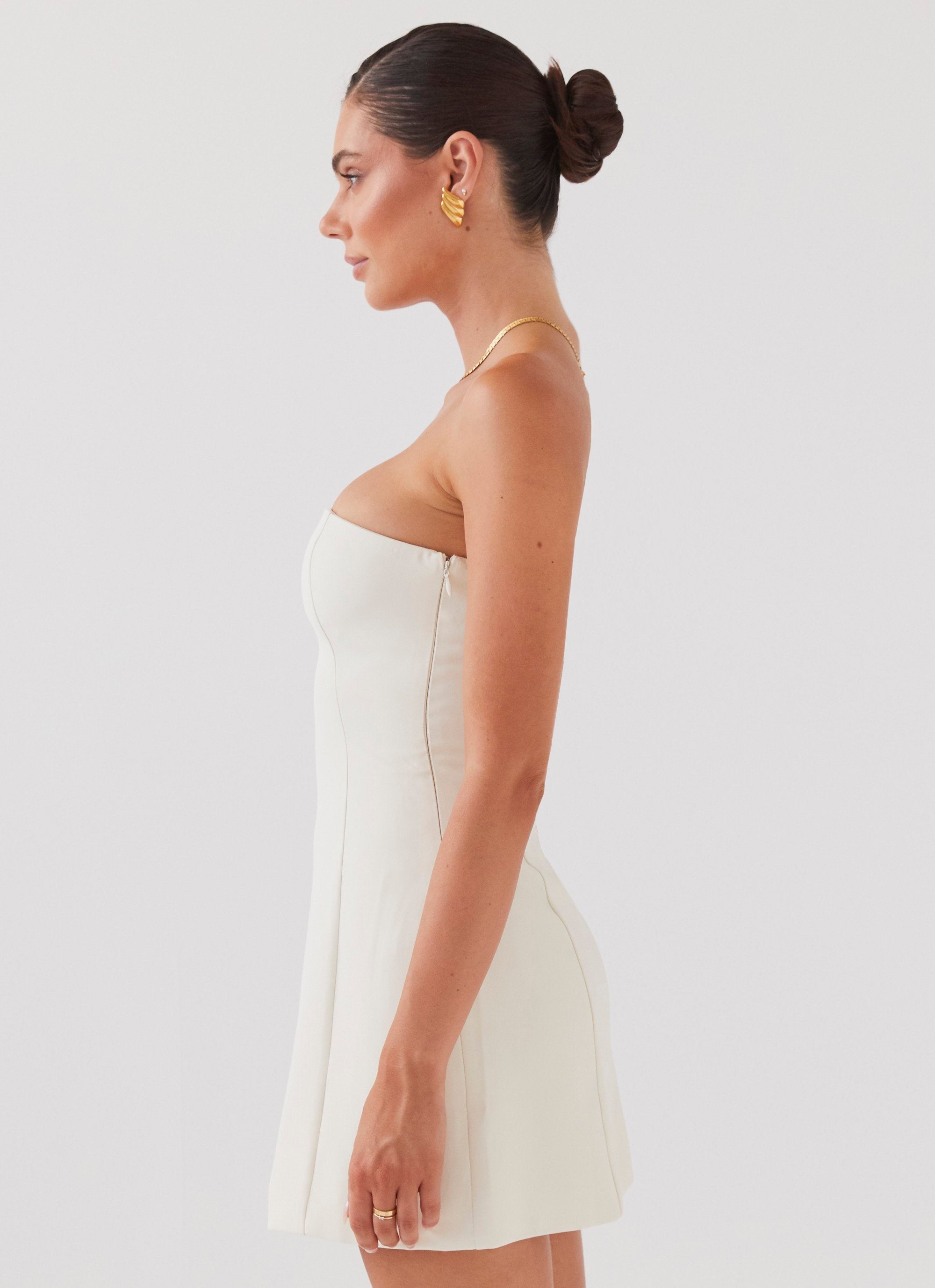 Womens Ayanna Strapless Mini Dress in the colour Ivory in front of a light grey background