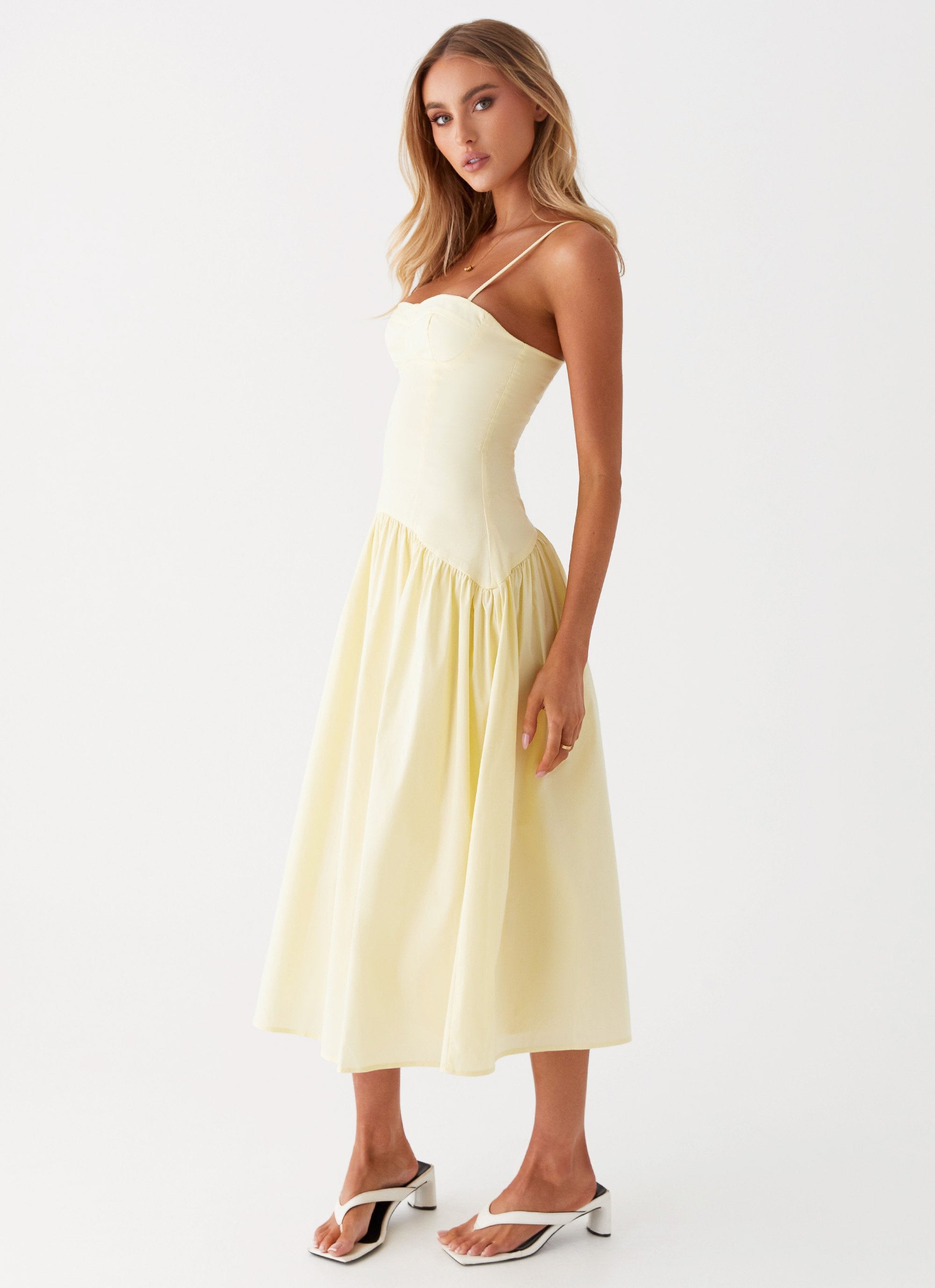 Womens Yvette Corset Midi Dress in the colour Yellow in front of a light grey background