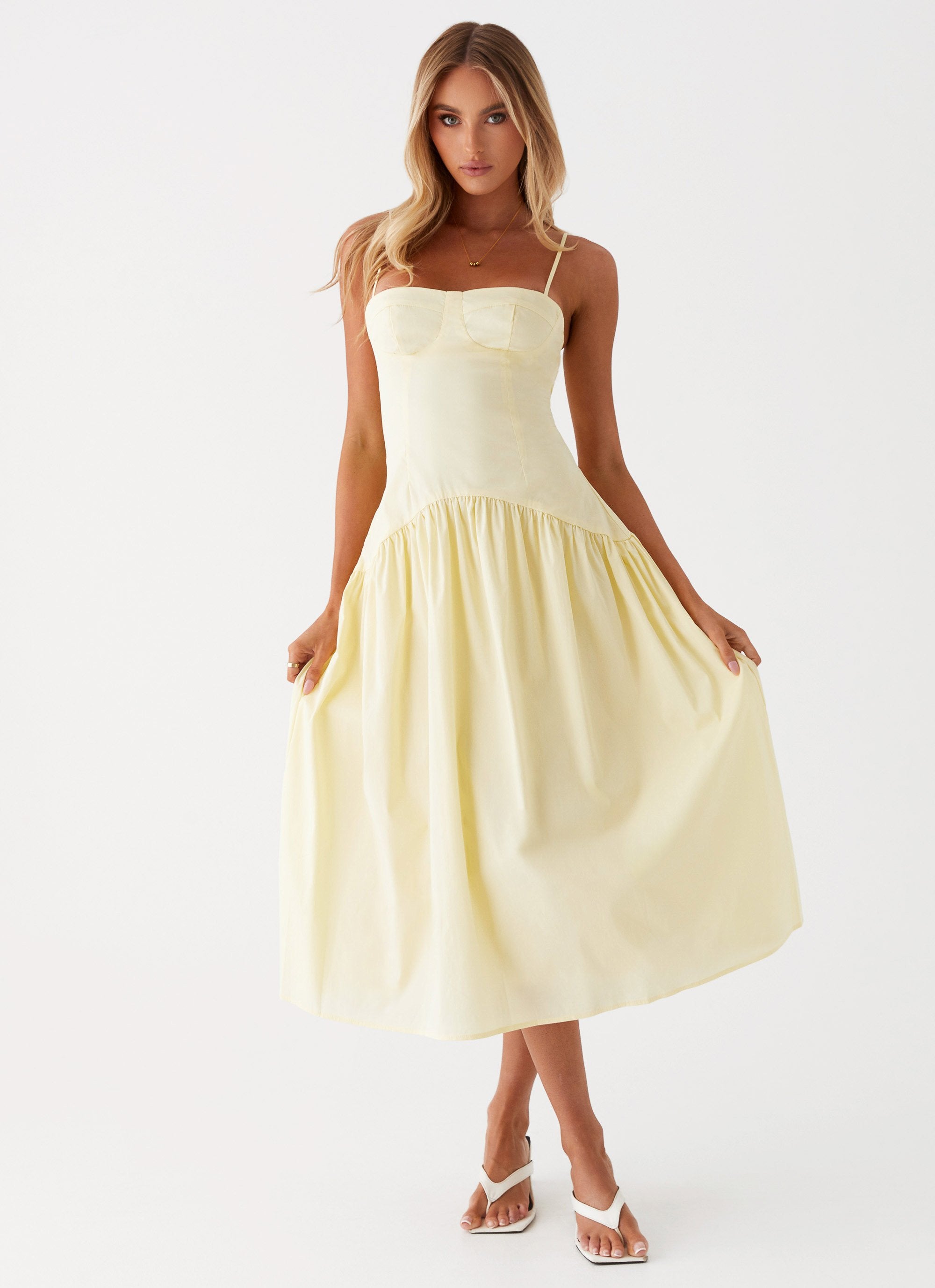 Womens Yvette Corset Midi Dress in the colour Yellow in front of a light grey background