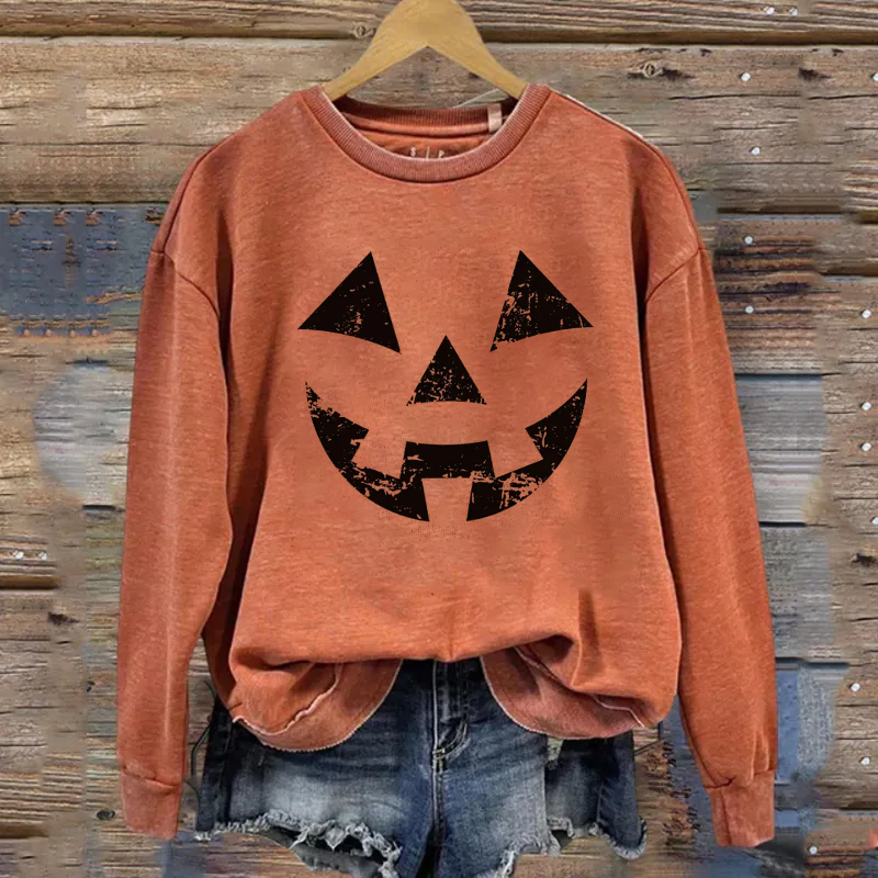 Distressed Pumpkin Face Sweatshirt