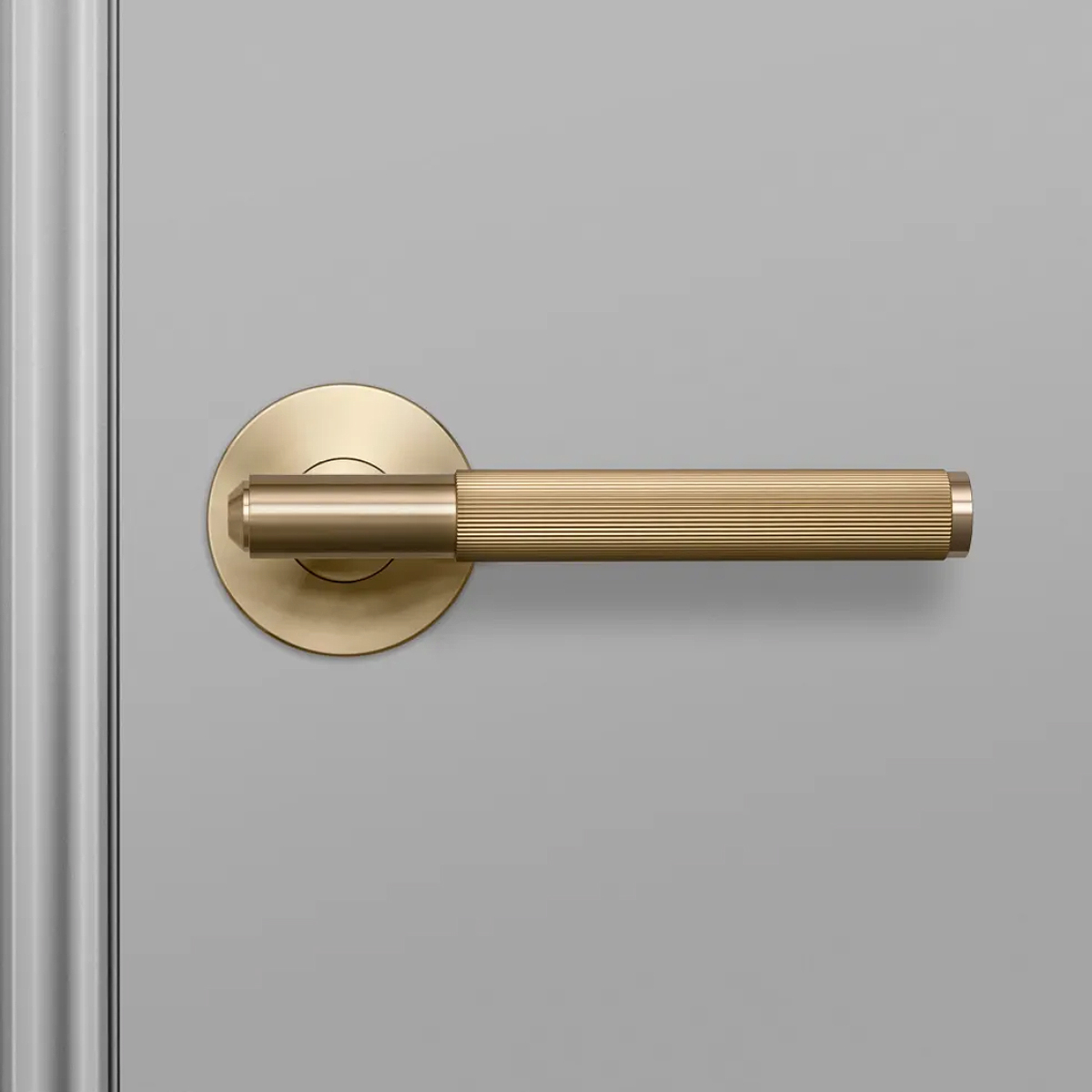 FIXED DOOR HANDLE / SINGLE-SIDED / LINEAR / BRASS