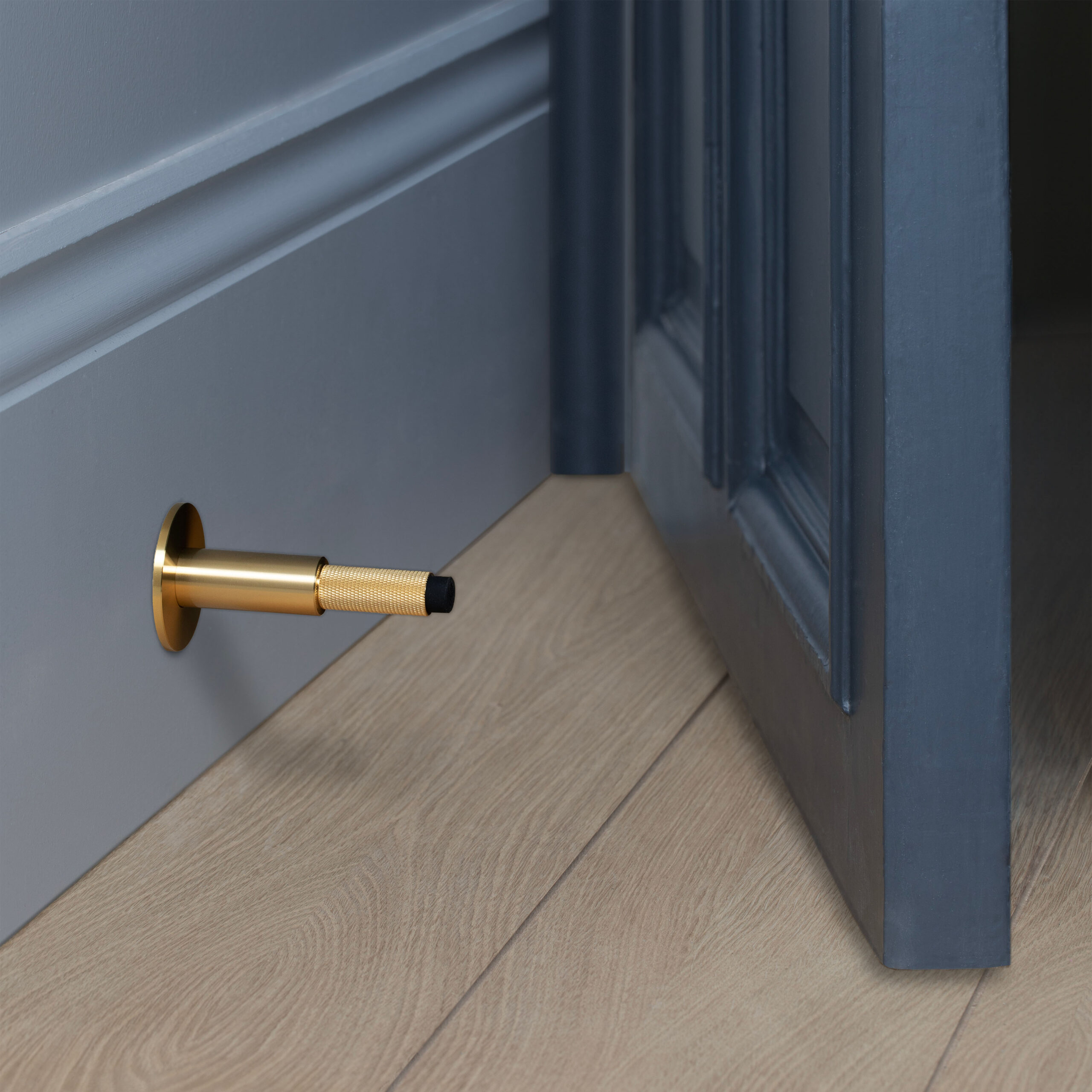 DOOR STOP / WALL / BRASS