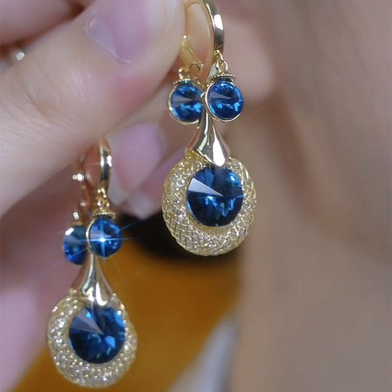 ✨【Compre um e ganhe outro】🎁🎁 Brincos de ouro de cristal azul luxuoso estilo quente 2024🔥🔥