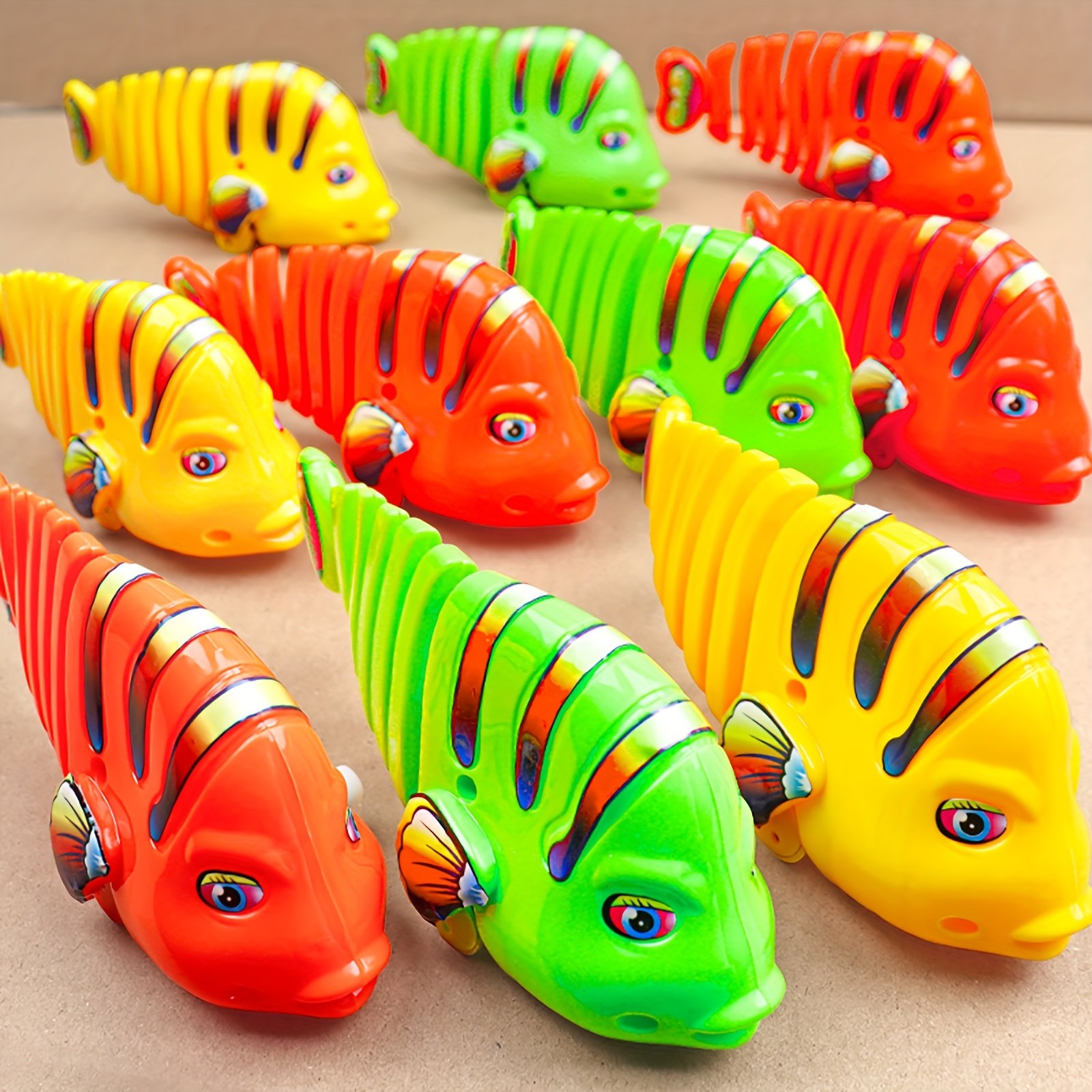 🐟Brinquedos de plástico para peixes com corda