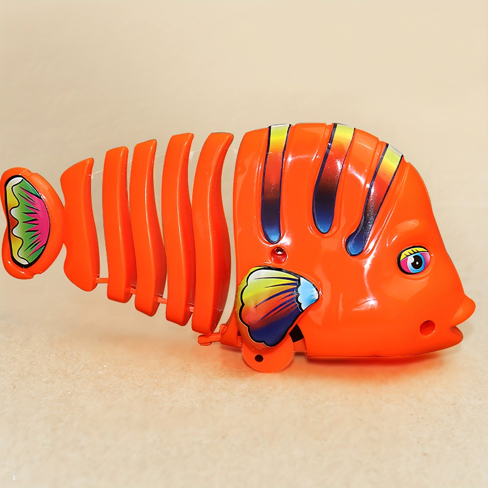 🐟Brinquedos de plástico para peixes com corda