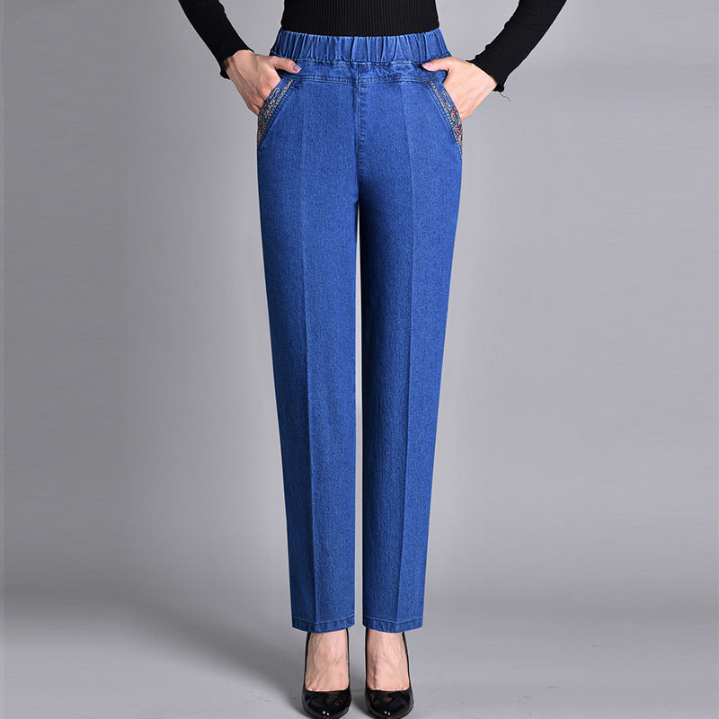 Jeans feminino com cintura elástica e bolso lateral