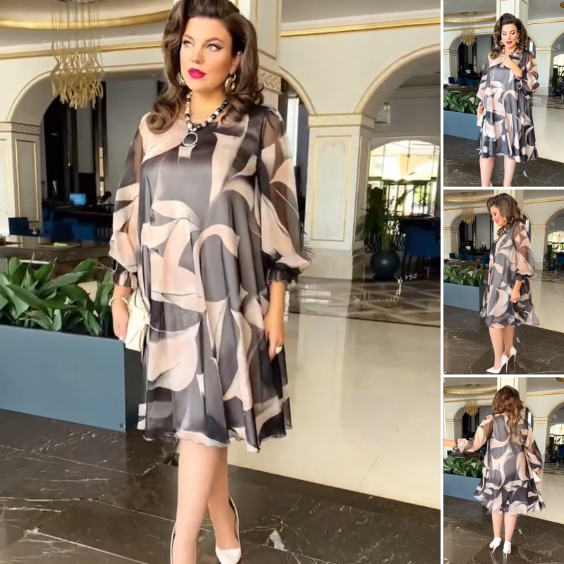 Vestido estampado fluido com decote redondo e manga comprida