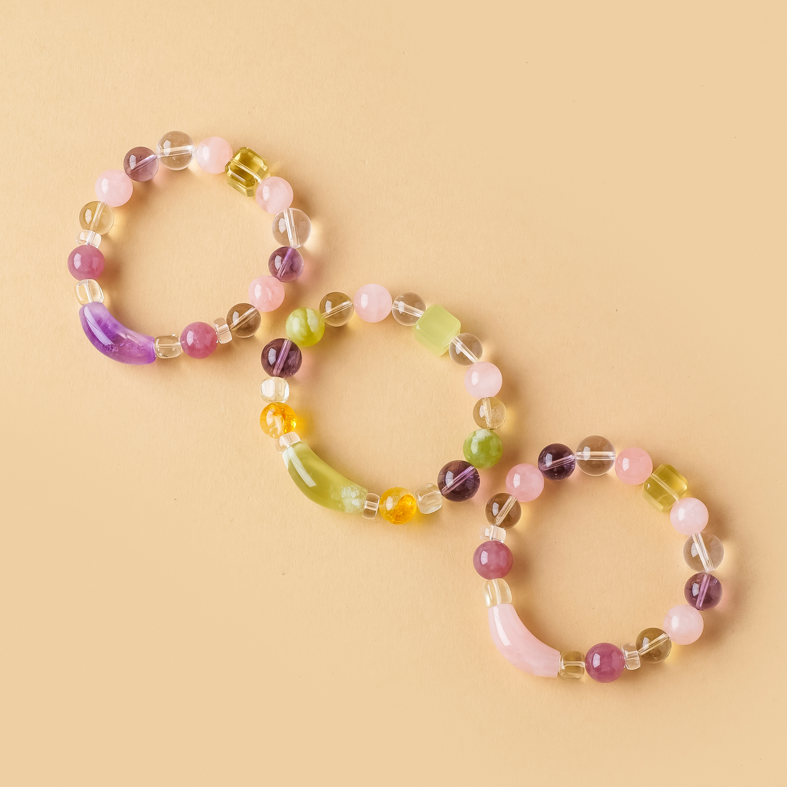 Crystal bracelet amethyst, citrine, clear quartz, glazed jade, and rose quartz.