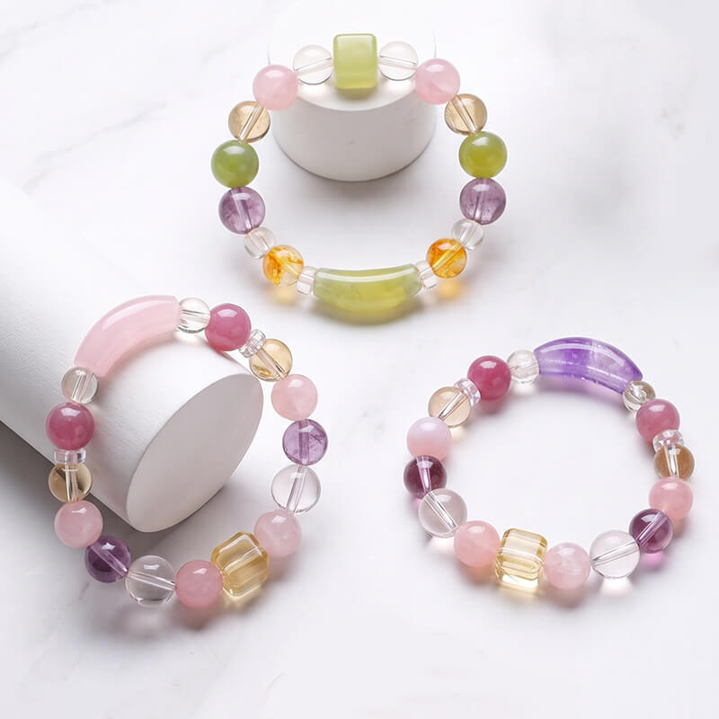 Crystal bracelet amethyst, citrine, clear quartz, Enameled Jade, and rose quartz.
