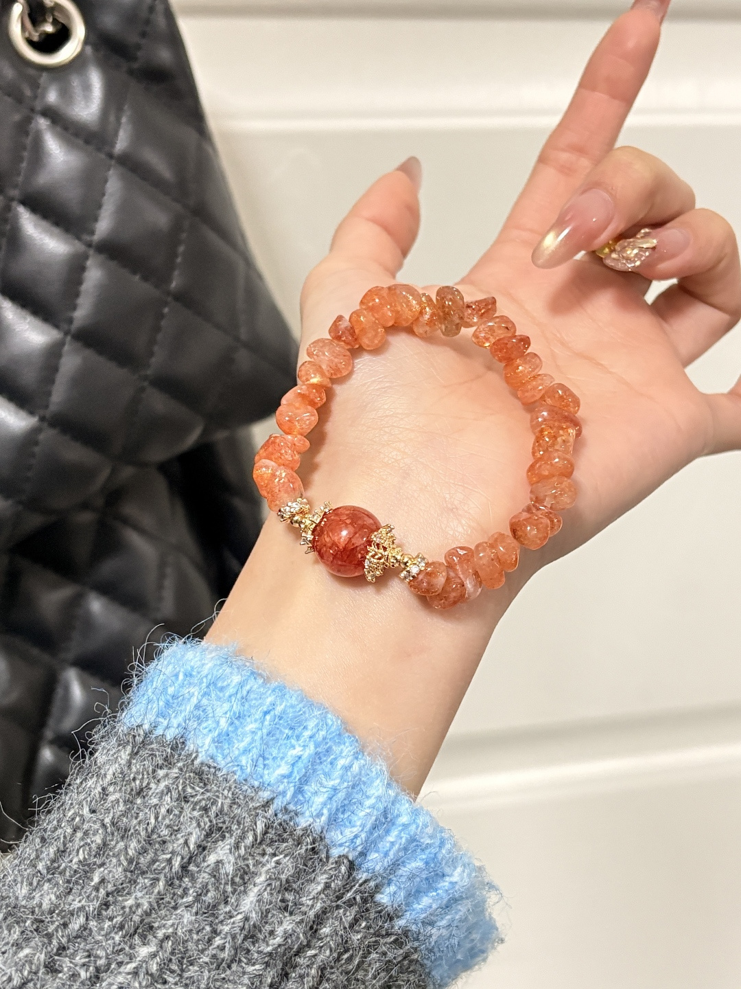 天然金太阳石随形红胶花水晶手串