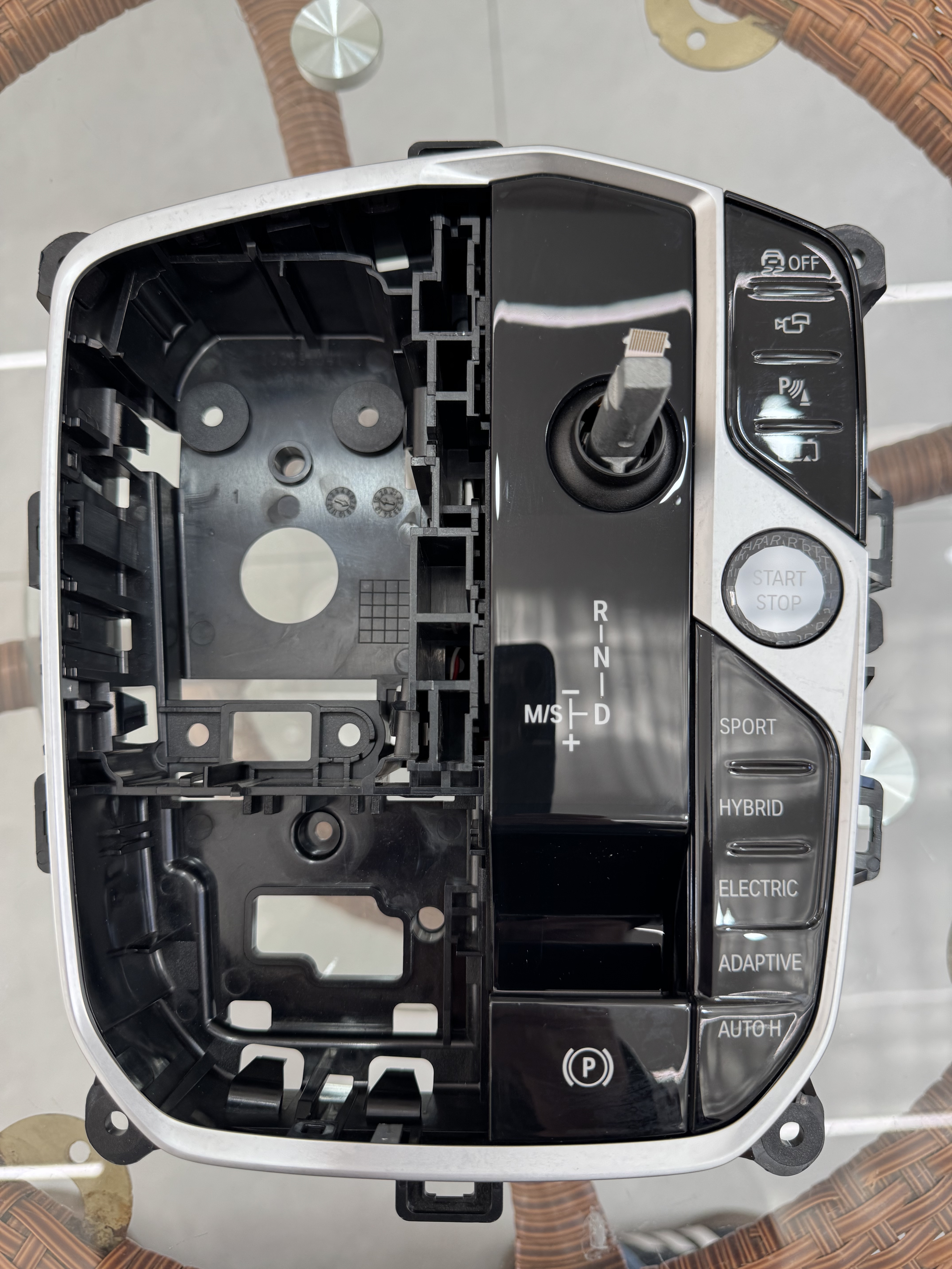 Shift lever base for RHD hybrid car