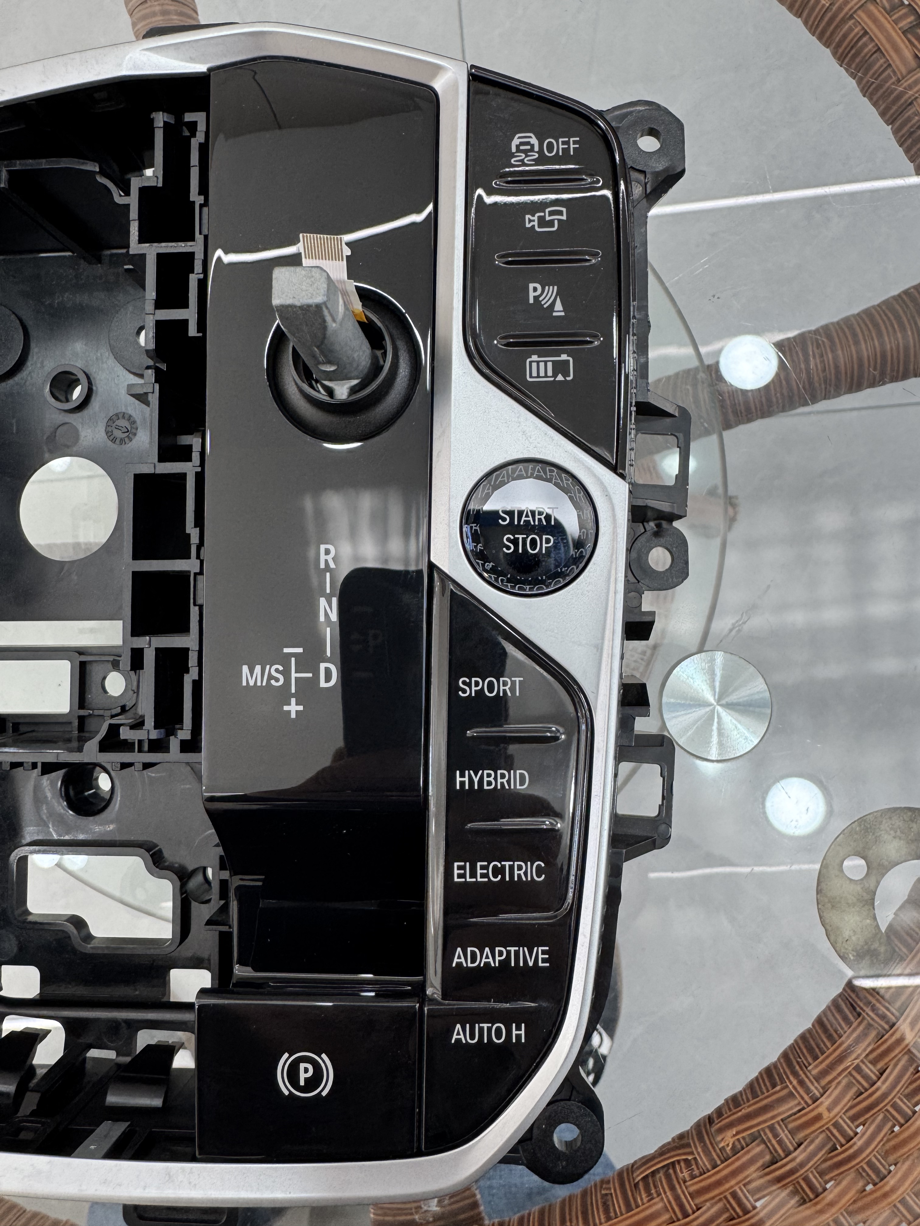 Shift lever base for RHD hybrid car