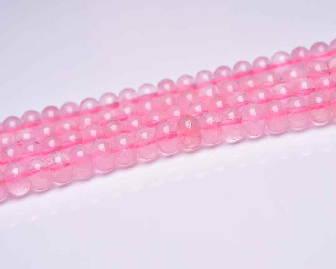 Rose quartz doughnut beads 8mm not natural color