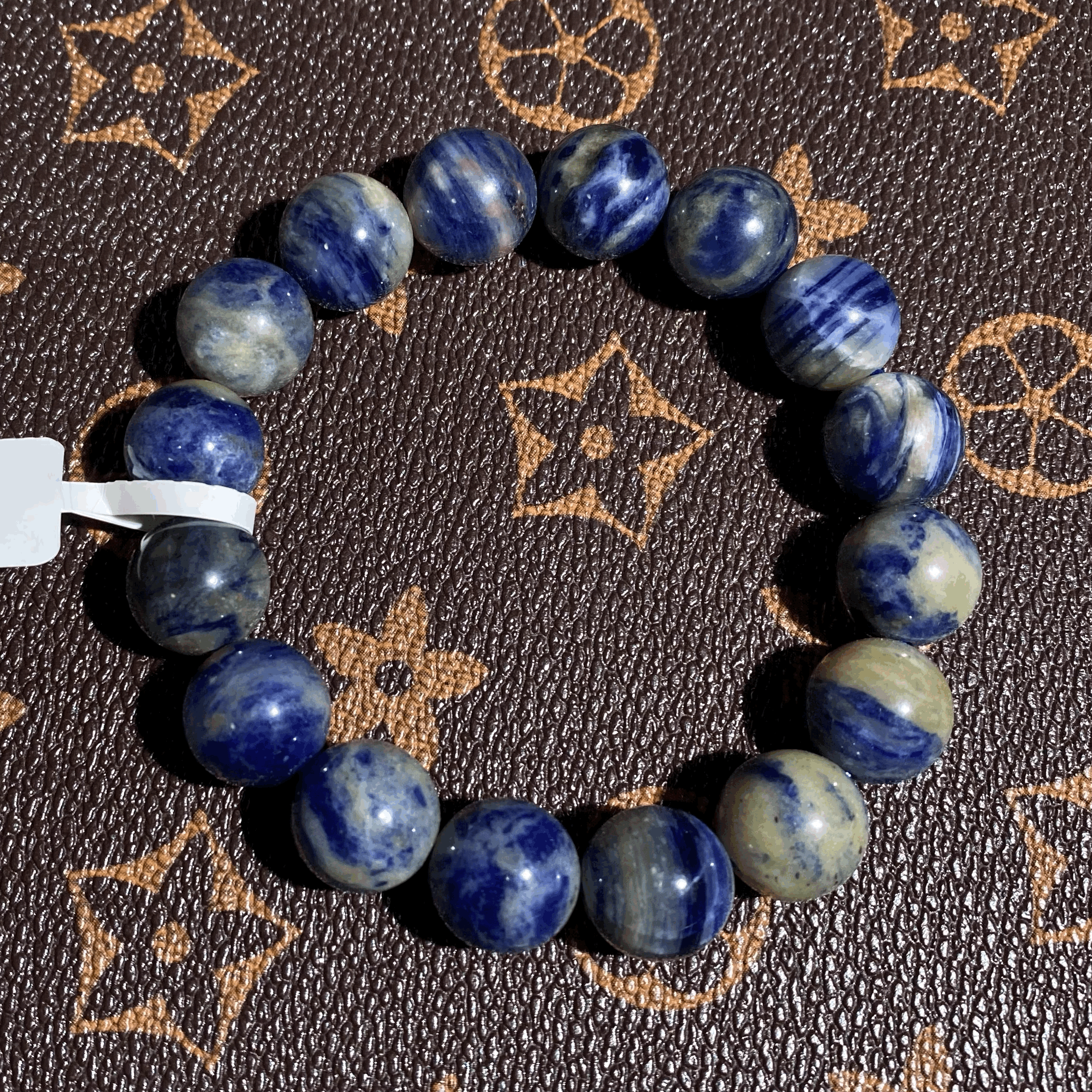 Blue sodalite bracelet 12.5mm $8