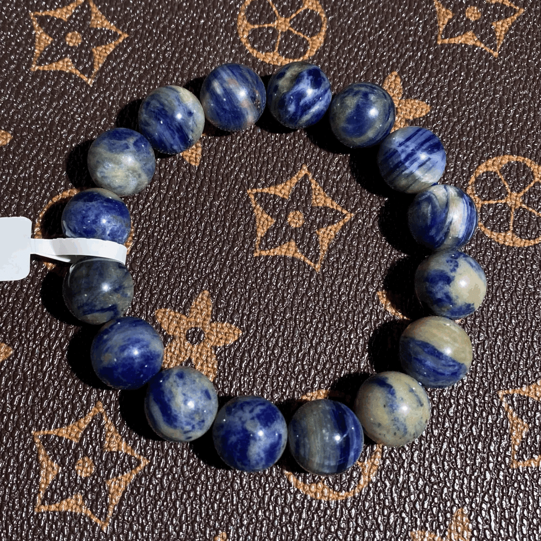 Blue sodalite bracelet 12.5mm $8