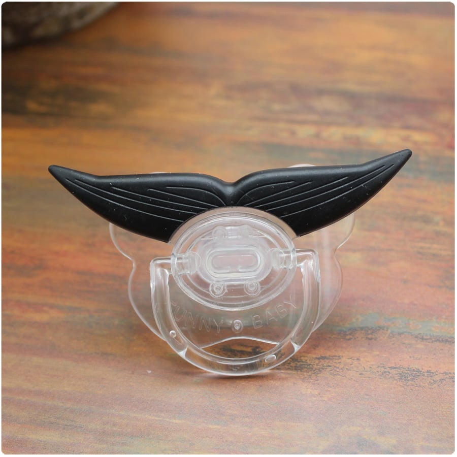 These Funny Teeth Baby Pacifiers Might Make Tough Parenting Times a Little More Tolerable