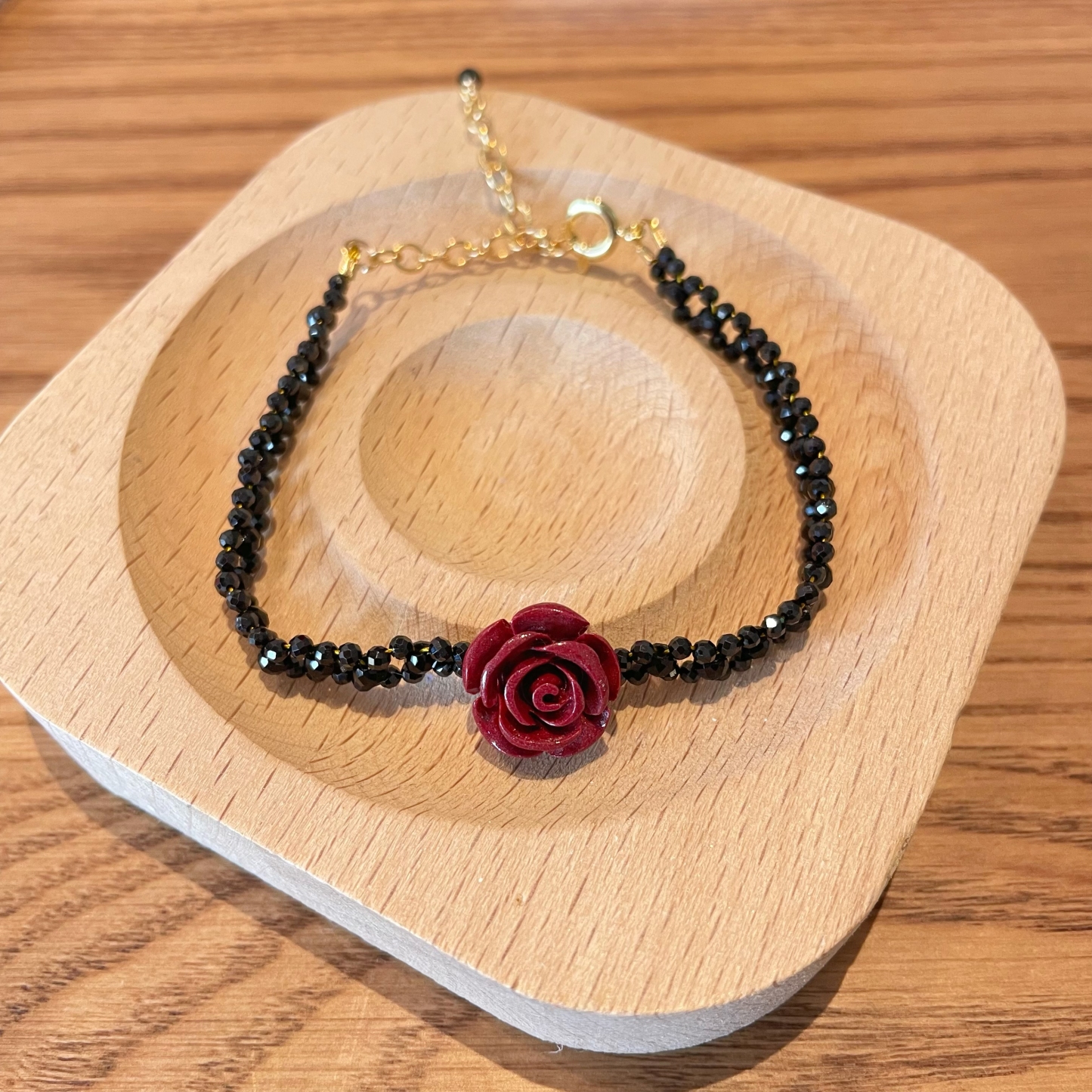 Woven Black Spinels Lace with Vermilion Stone Carved Rose Bracelet