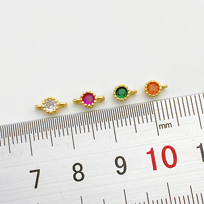 Gold Plated Rimmed Round Colored Zircon Charm