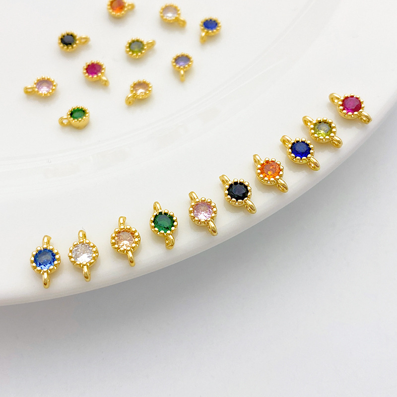 Gold Plated Rimmed Round Colored Zircon Charm