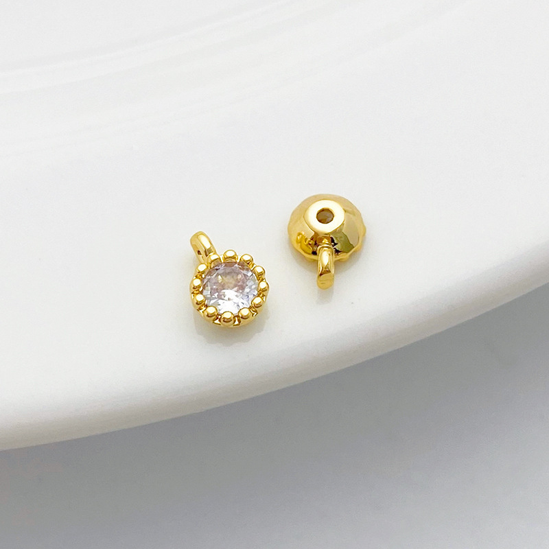 Gold Plated Rimmed Round Colored Zircon Charm