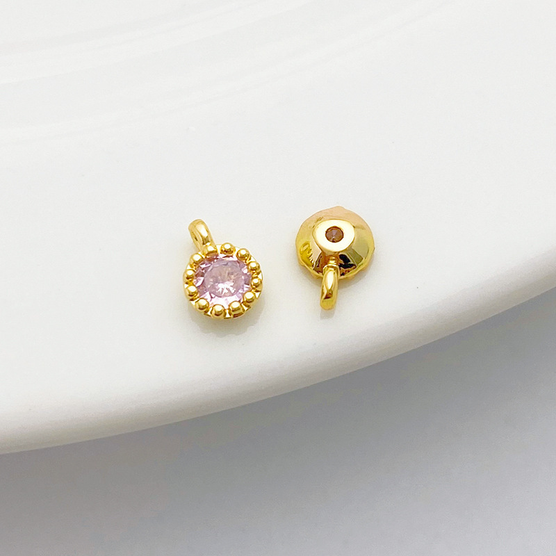 Gold Plated Rimmed Round Colored Zircon Charm