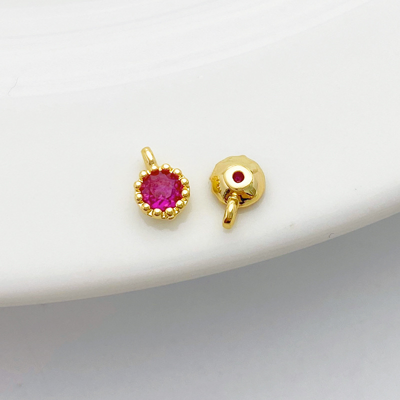 Gold Plated Rimmed Round Colored Zircon Charm
