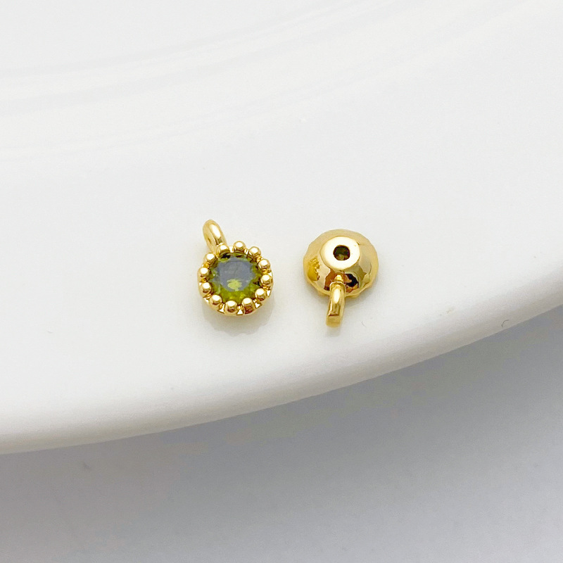 Gold Plated Rimmed Round Colored Zircon Charm