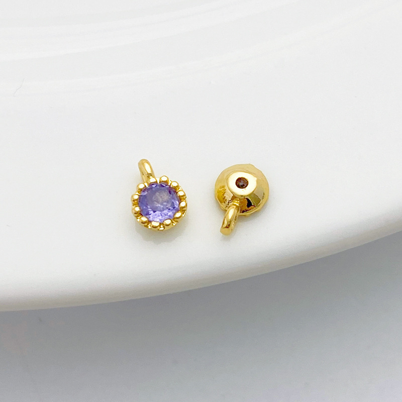 Gold Plated Rimmed Round Colored Zircon Charm