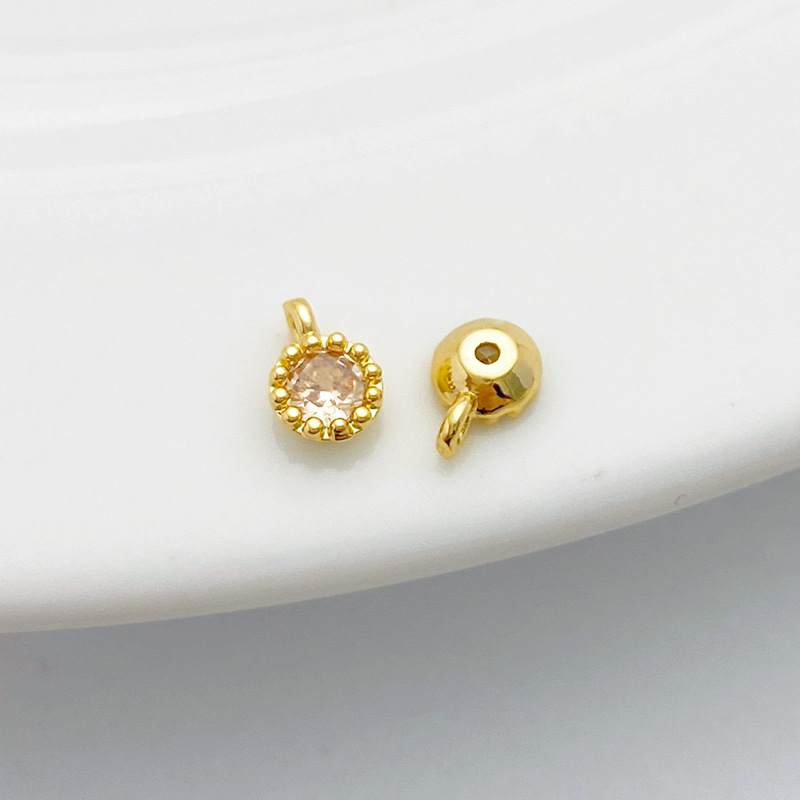 Gold Plated Rimmed Round Colored Zircon Charm